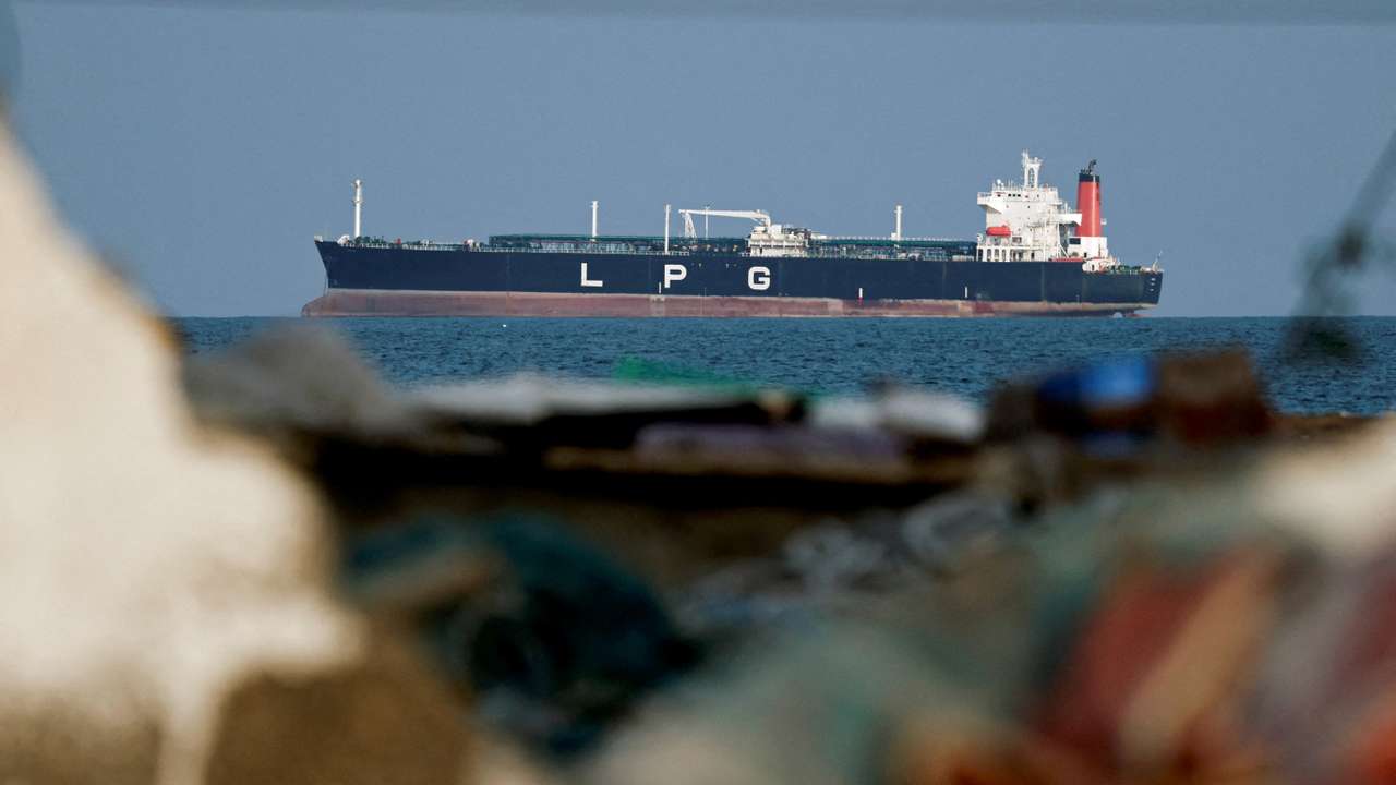 FILE PHOTO: An LPG gas tanker at anchor as traffic is down in the Strait of Hormuz, in Shinas