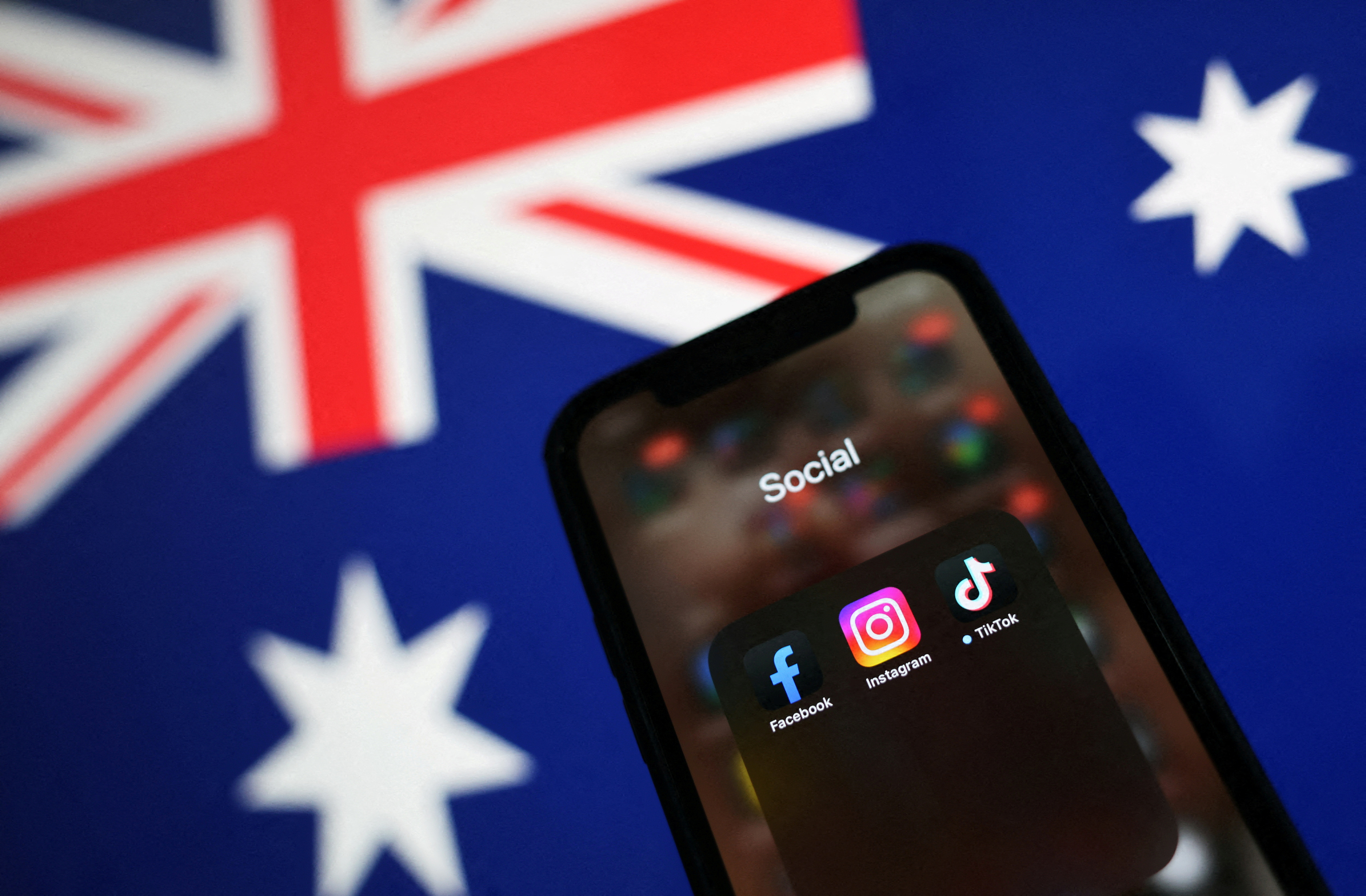 Illustration shows Facebook, Instagram and Tiktok apps on a smartphone