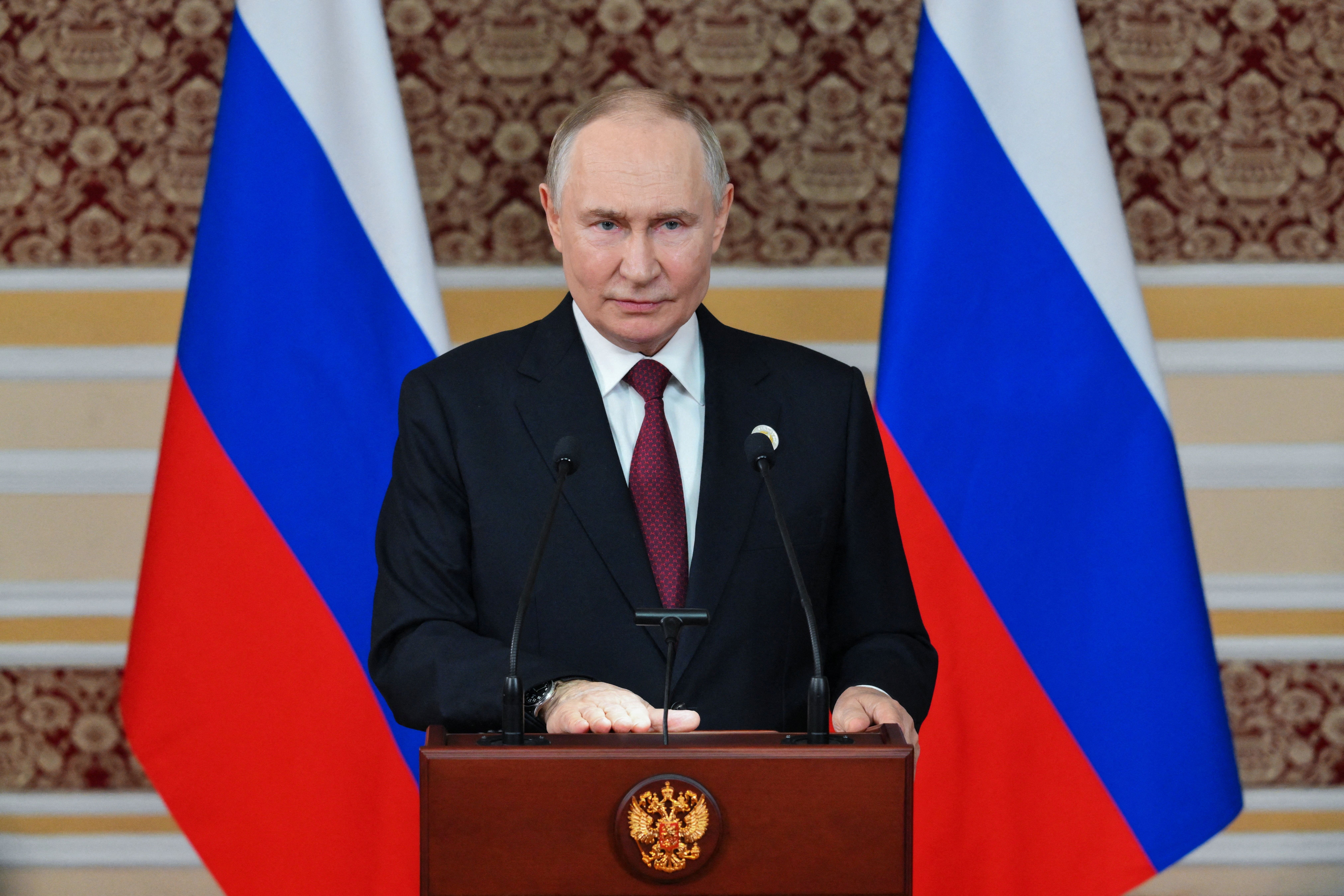 Russian President Putin attends a press conference in Dushanbe