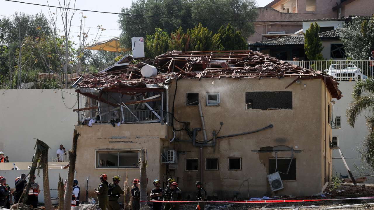 The impact site following Iranian missile barrages as the U.S.-Israeli conflict with Iran continues, in central Israel