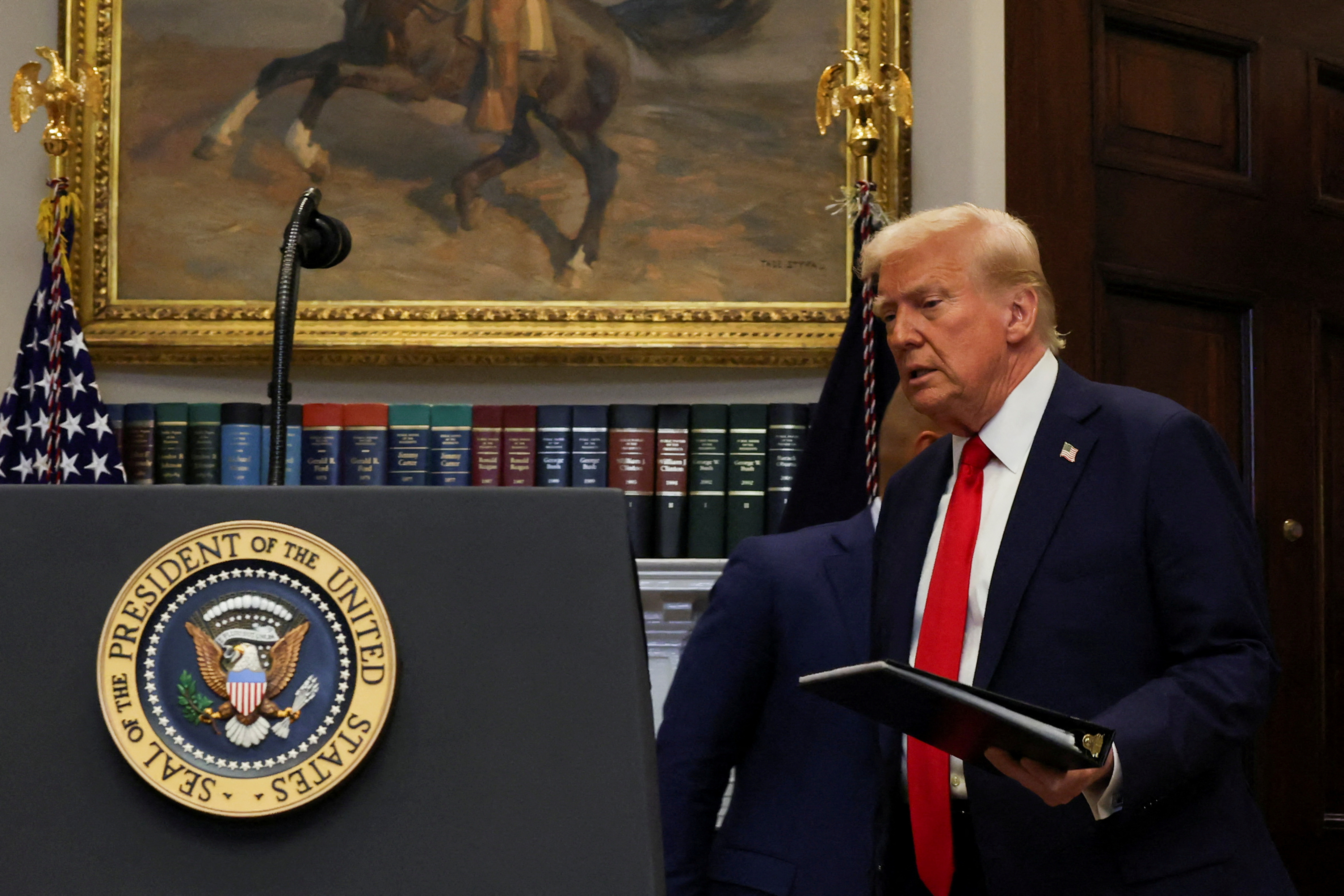 U.S. President Trump delivers remarks on Ai infrastructure at the Roosevelt room at White House in Washington