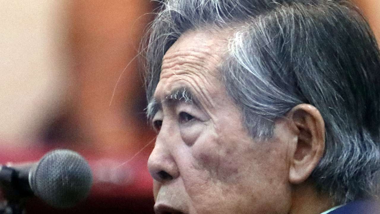 Former President of Peru Alberto Fujimori attends a trial as a witness at the navy base in Callao