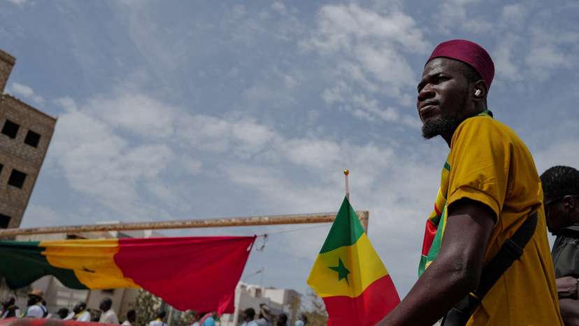 FILE PHOTO: Senegalese civil society groups protest over delayed presidential election in Dakar