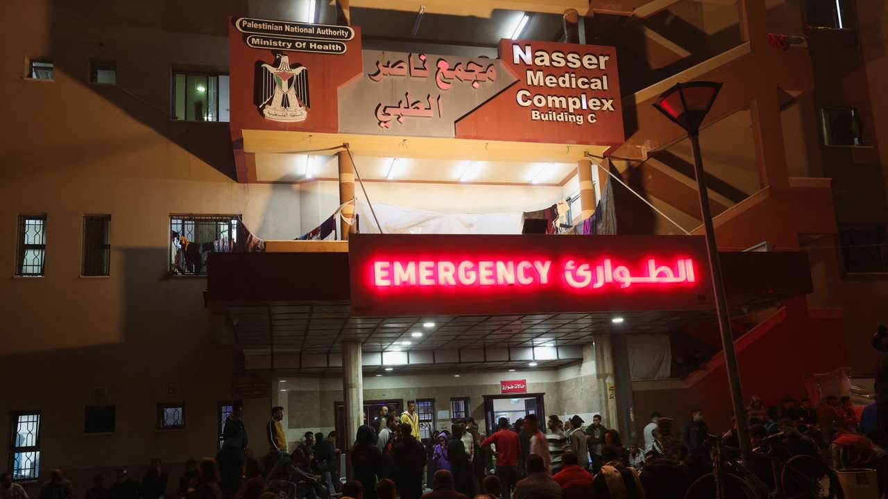 Palestinians gather outside Nasser hospital following Israeli strikes, in Khan Younis