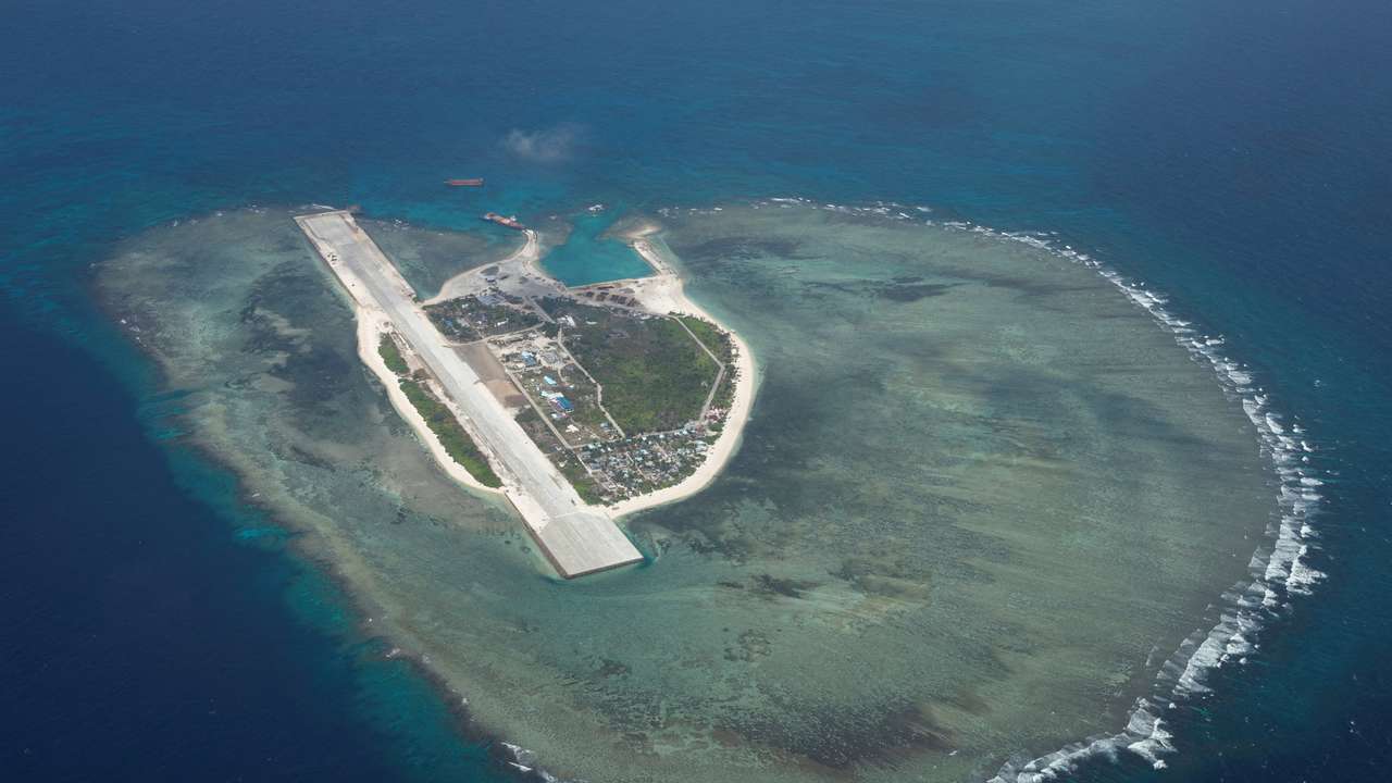 FILE PHOTO: Philippine Coast Guard flyby over the South China Sea