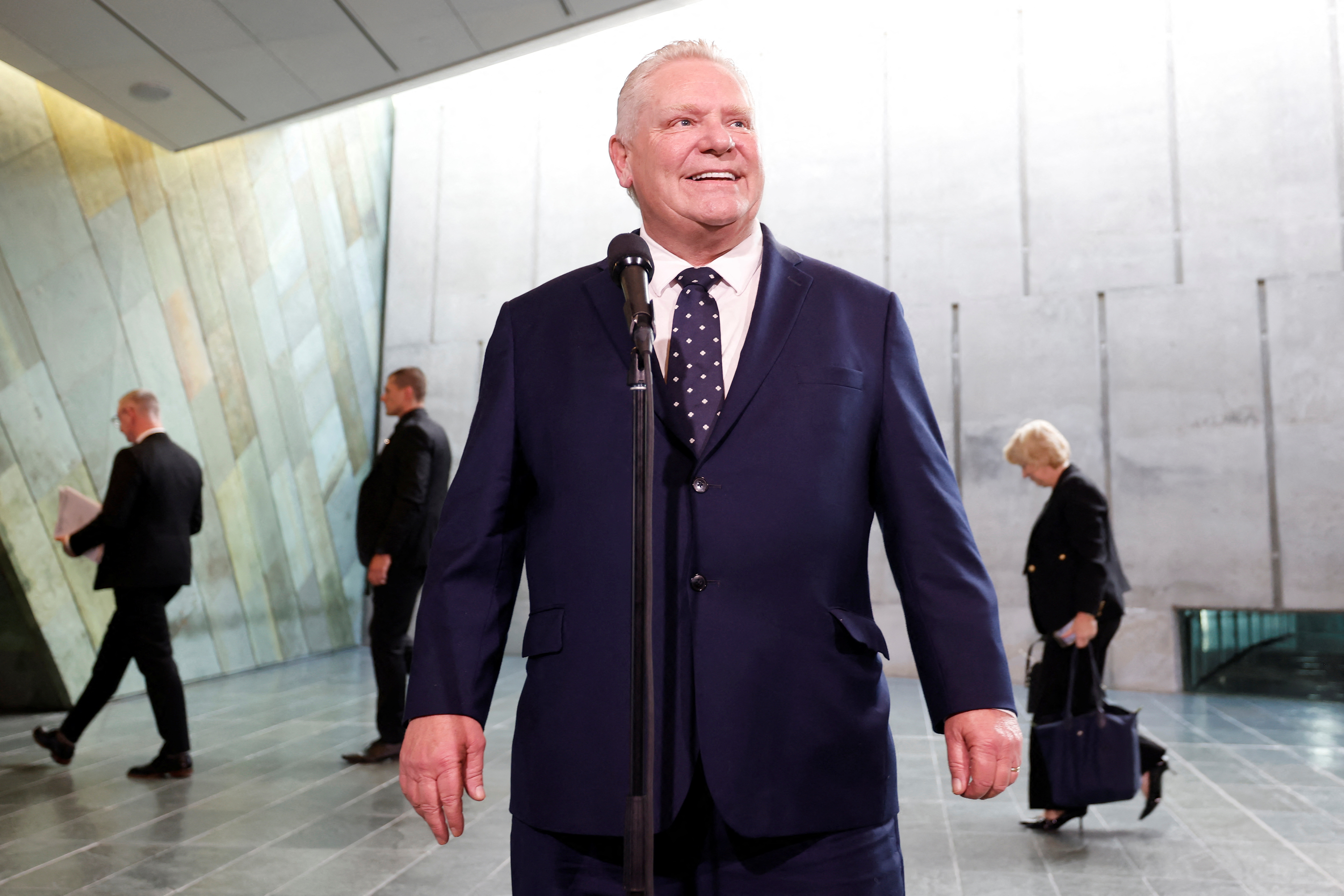 Ontario Premier Doug Ford speaks to journalists before a meeting with federal, provincial and territorial leaders at the Canadian War Museum in Ottawa