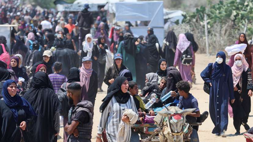 Palestinians seek aid from the U.S.-backed Gaza Humanitarian Foundation, near Rafah