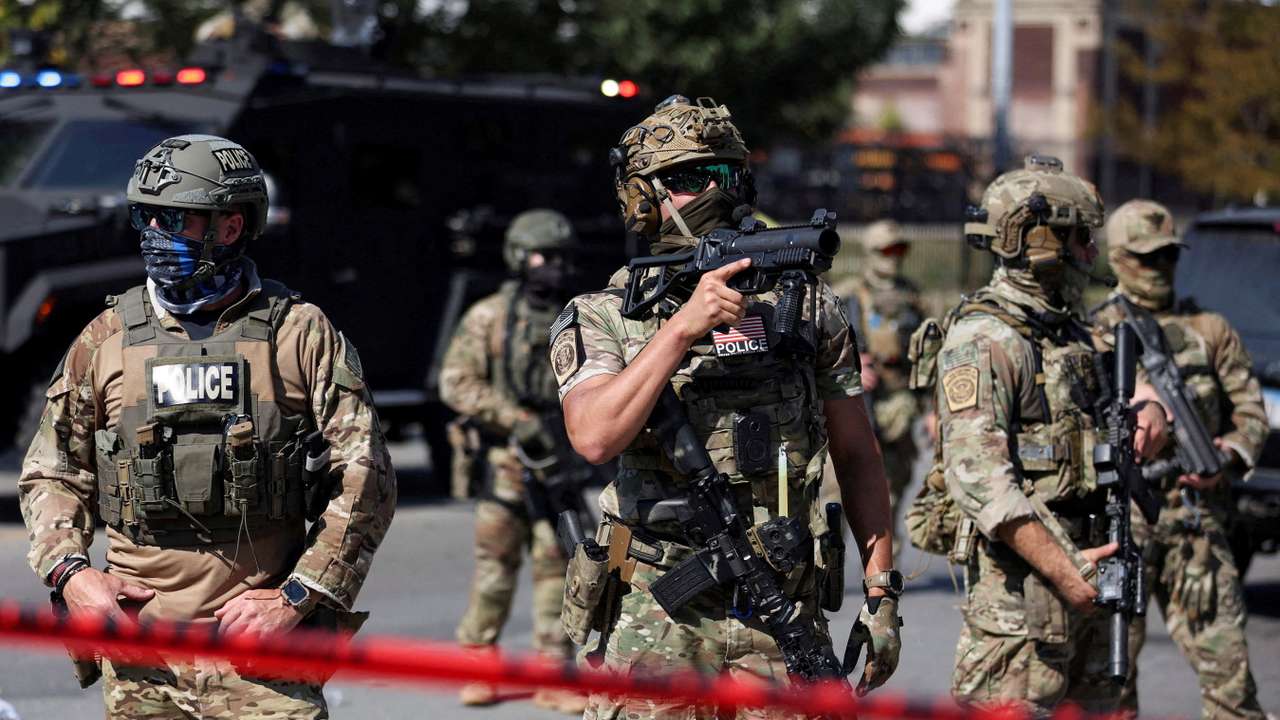 FILE PHOTO: People protest during a standoff with ICE and federal officers in Chicago