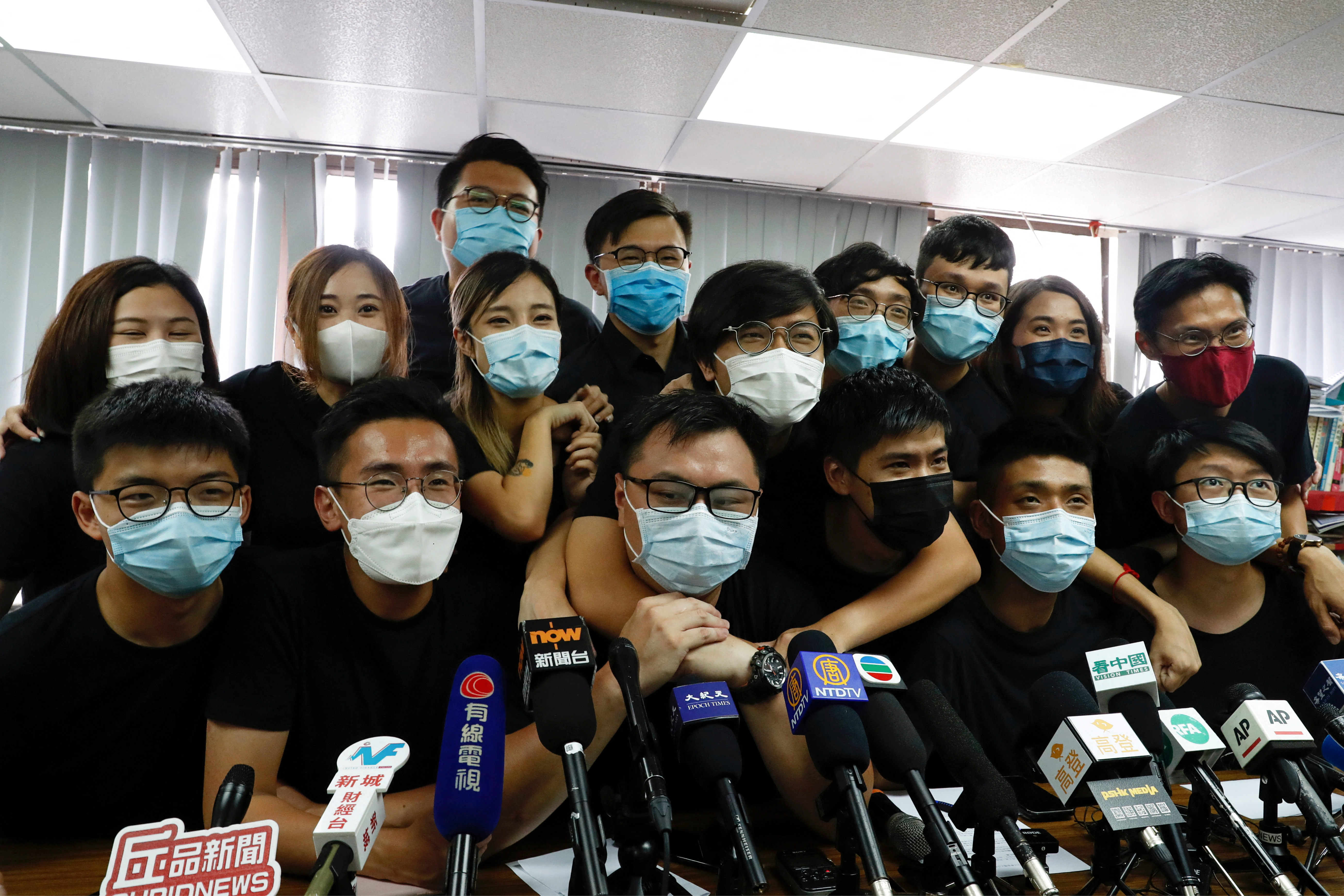 FILE PHOTO: Young Hong Kong democrats from the so-called "resistance" or localists camp attend a news conference after pre-election in Hong Kong