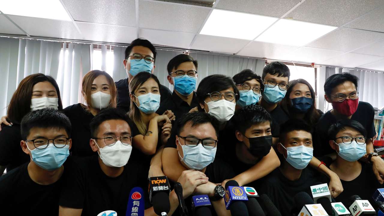 FILE PHOTO: Young Hong Kong democrats from the so-called "resistance" or localists camp attend a news conference after pre-election in Hong Kong