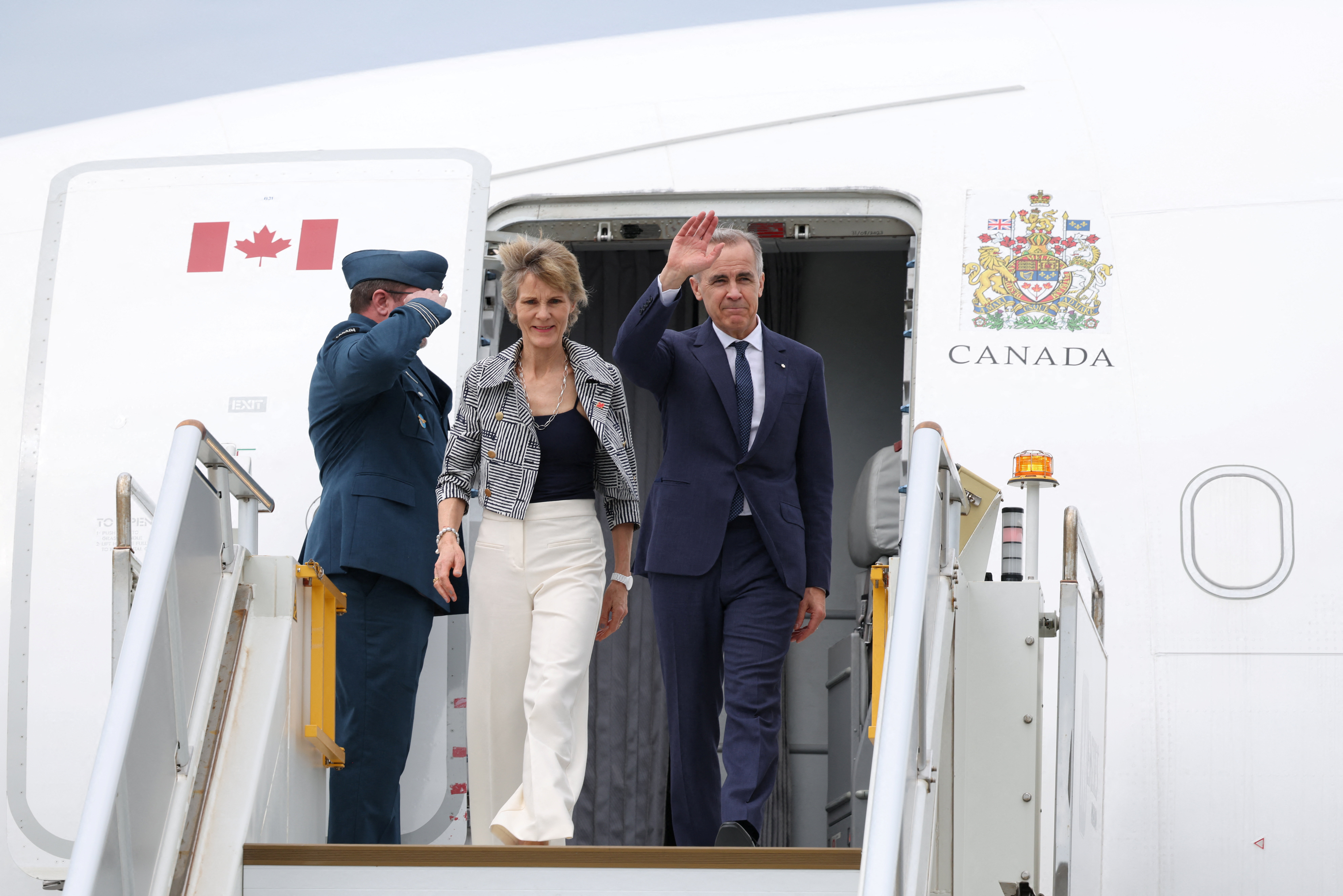 Canadian Prime Minister Mark Carney and his wife Diana Fox Carney arrive in Sydney