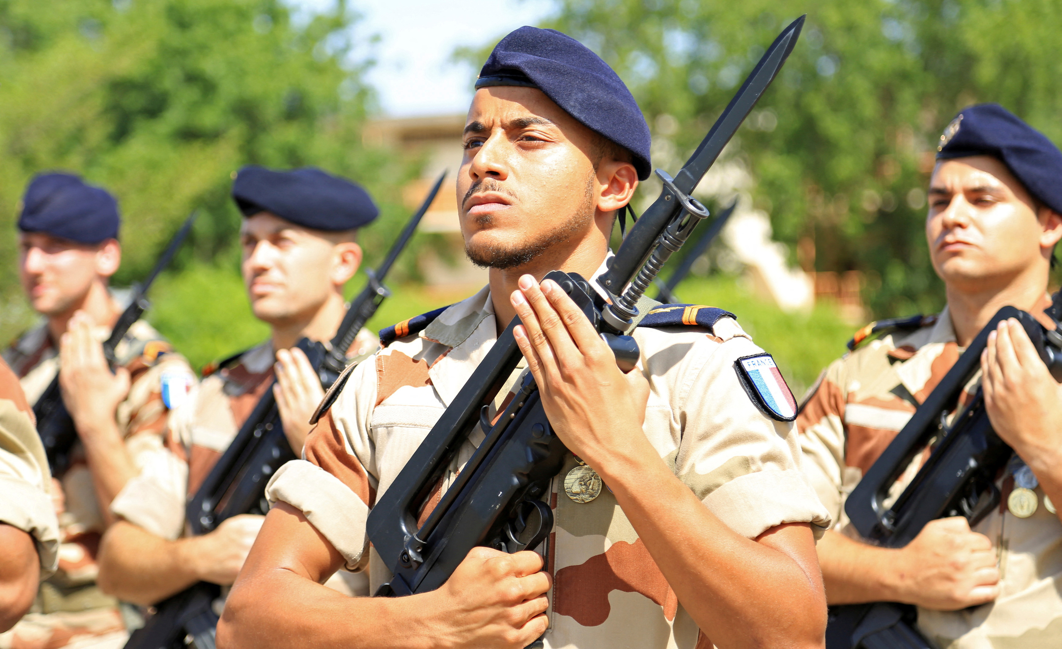 FILE PHOTO: French soldiers stand at attention during a morning drill at the French military base in Chadian capital N'Djamena