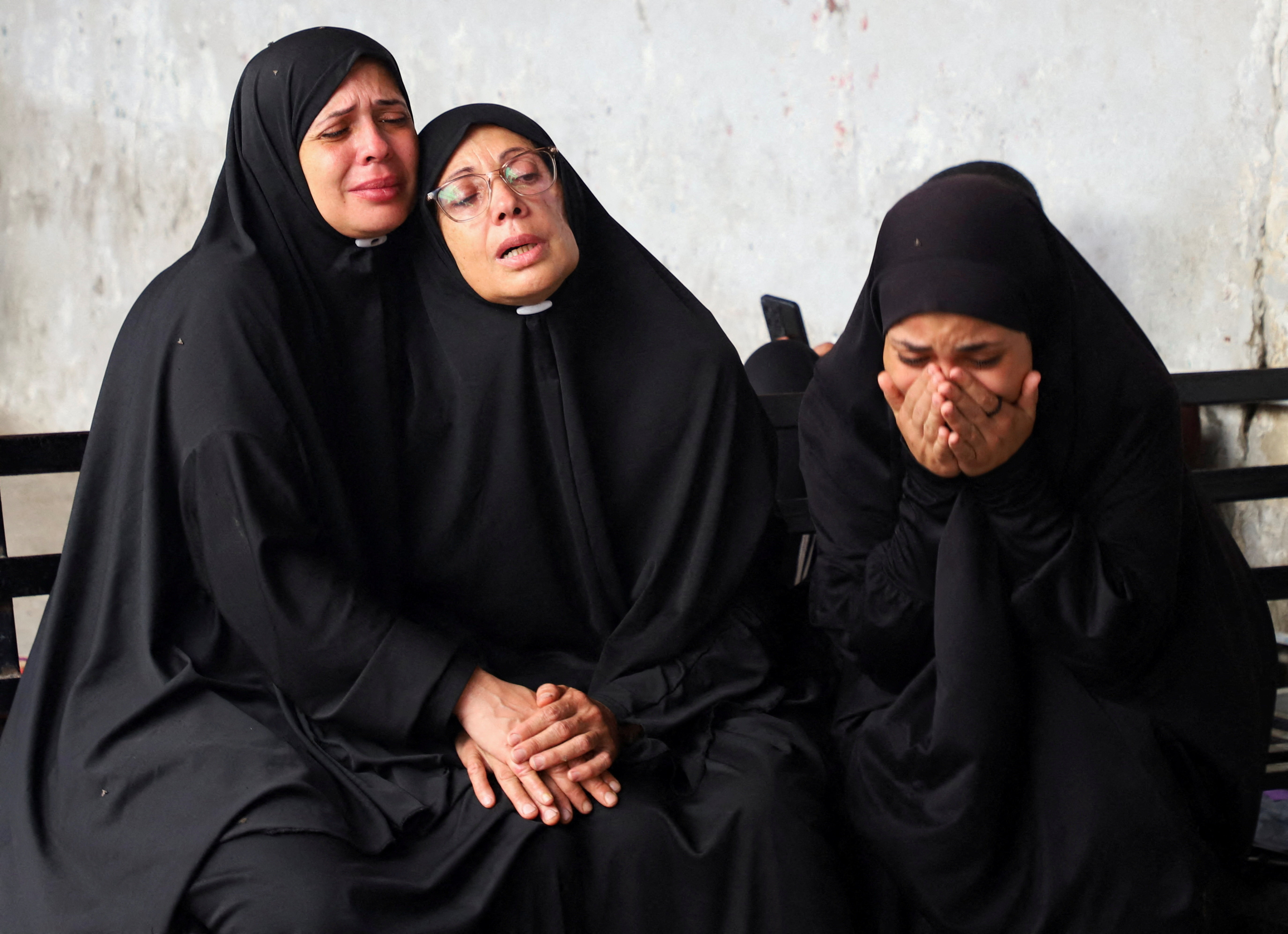Aftermath of a deadly overnight Israeli strikes on a building where displaced people were taking shelter in Gaza City