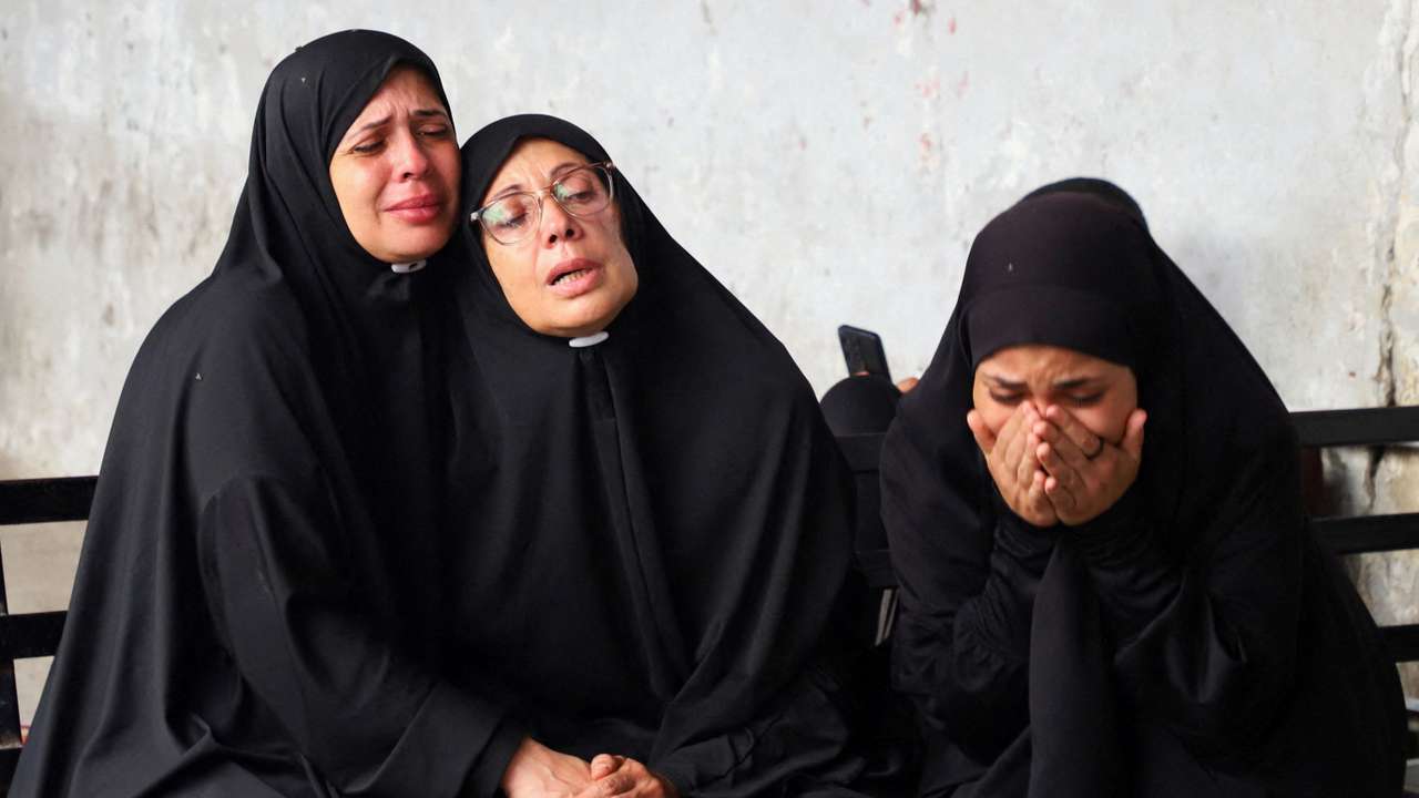 Aftermath of a deadly overnight Israeli strikes on a building where displaced people were taking shelter in Gaza City