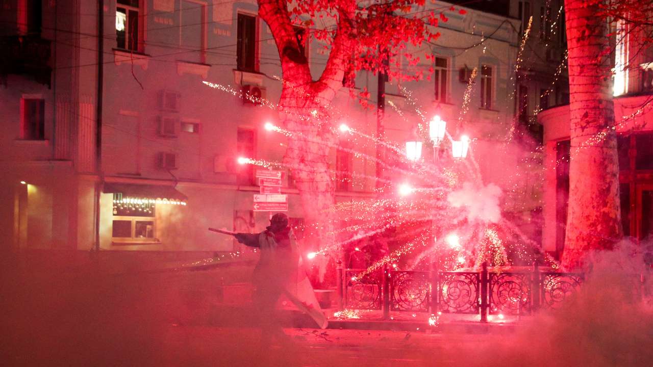 FILE PHOTO: Rally to protest against the Georgian government's decision to suspend talks on joining the EU, in Tbilisi