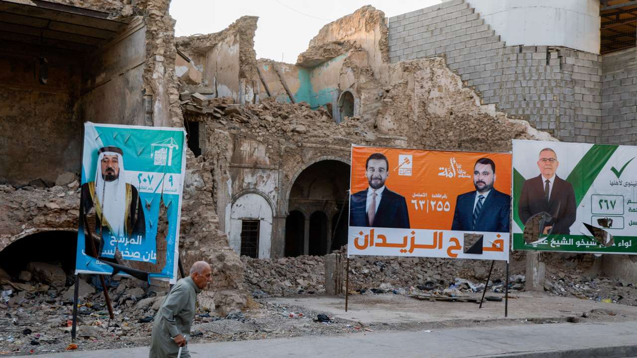 Campaign posters ahead of Iraqi parliamentary election, in Mosul