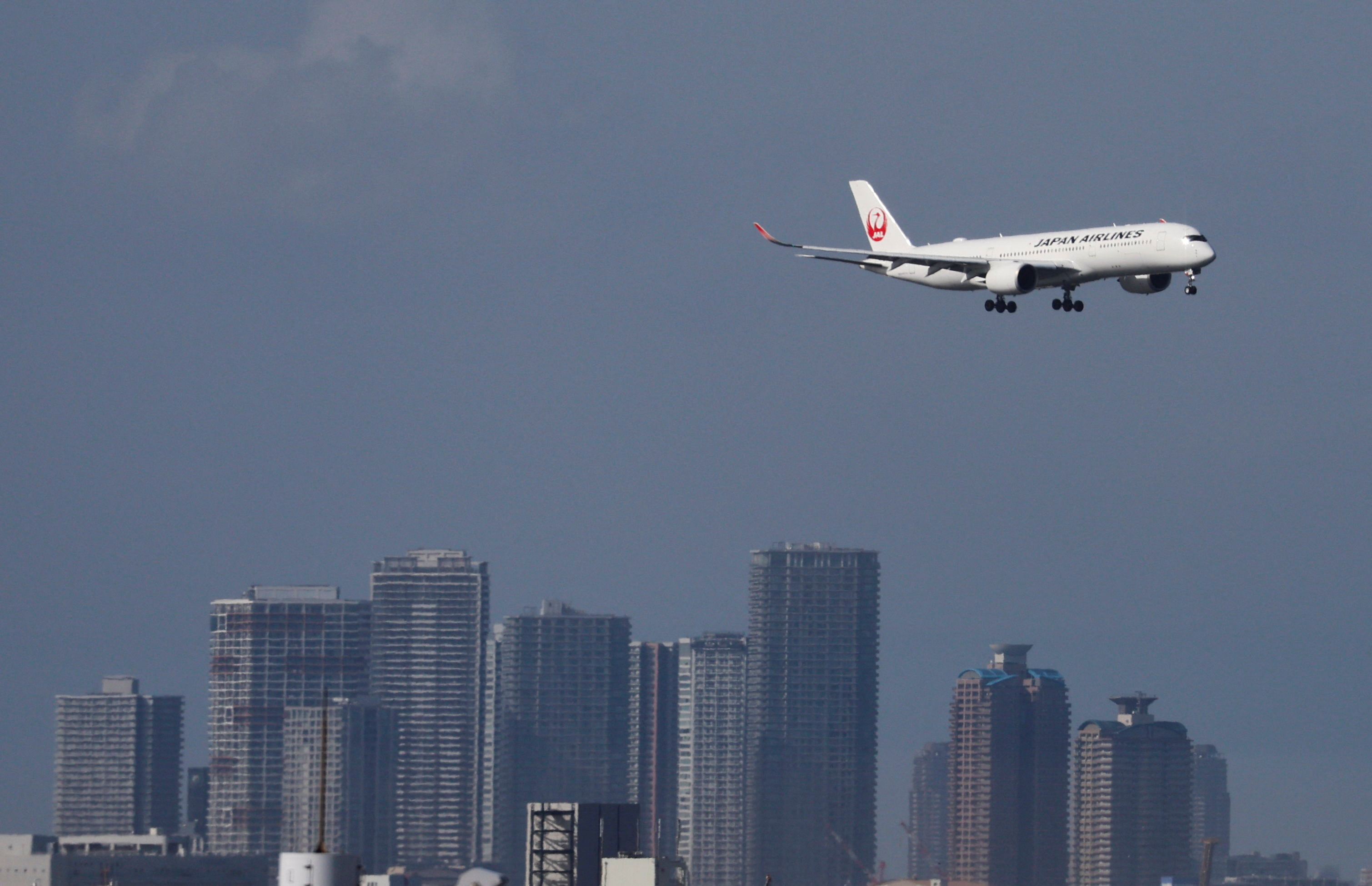 A Japan Airlines (JAL) aircraft approaches to land at Haneda Airport in Tokyo