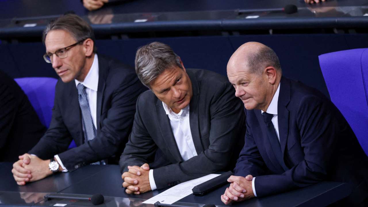 FILE PHOTO: Germany's newly appointed Finance Minister Joerg Kukies, German Economy and Climate Minister Robert Habeck and German Chancellor Olaf Scholz sit at the lower house of parliament, Bundestag in Berlin,