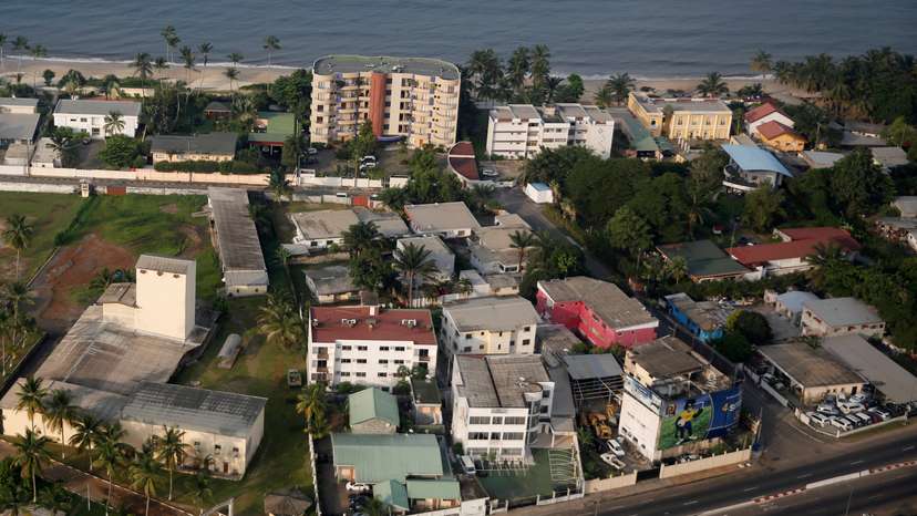 FILE PHOTO: An aerial view shows traffic and houses in Libreville