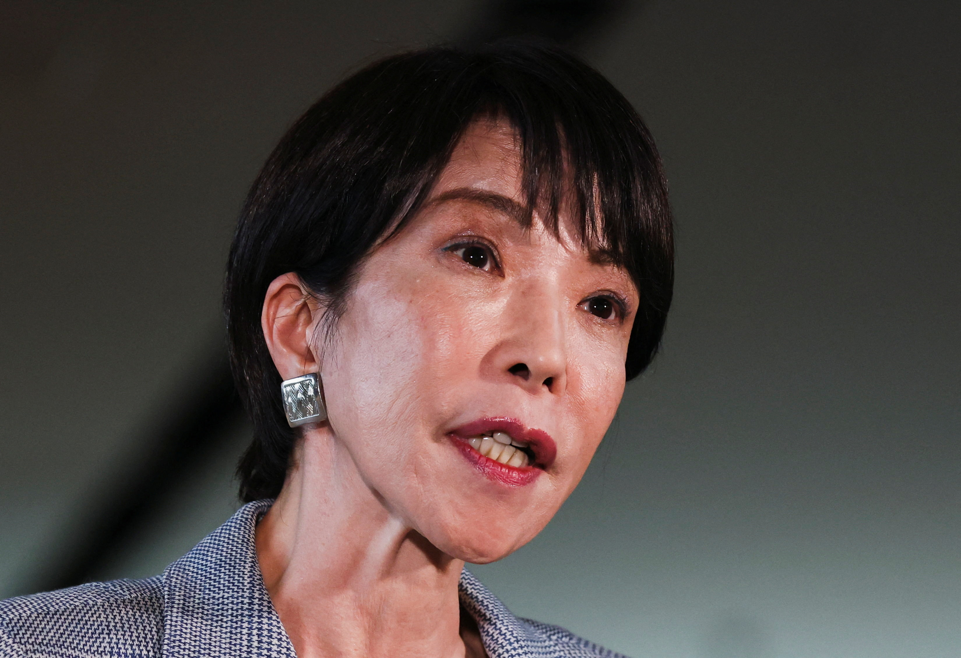 Japan's Prime Minister Sanae Takaichi speaks to the media after a telephone call with U.S. President Donald Trump, at her official residence in Tokyo