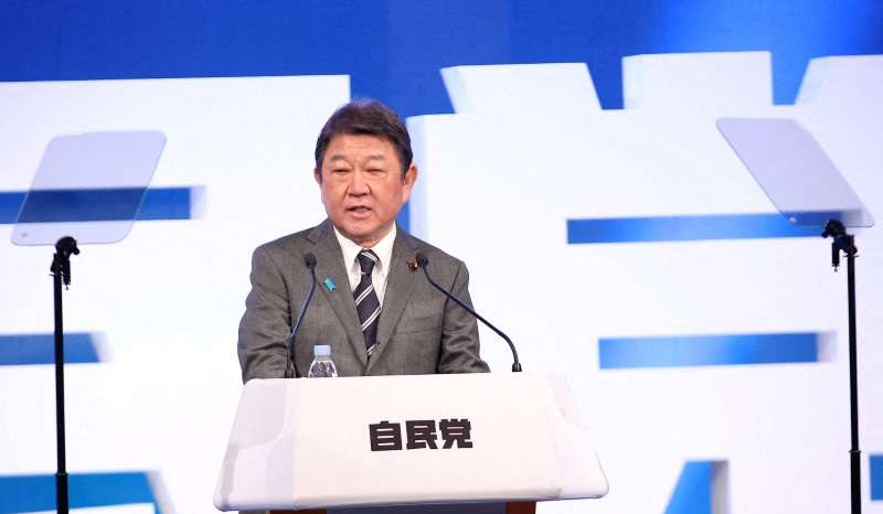 FILE PHOTO: Japan's ruling Liberal Democratic Party lawmakers hold an annual party convention, in Tokyo