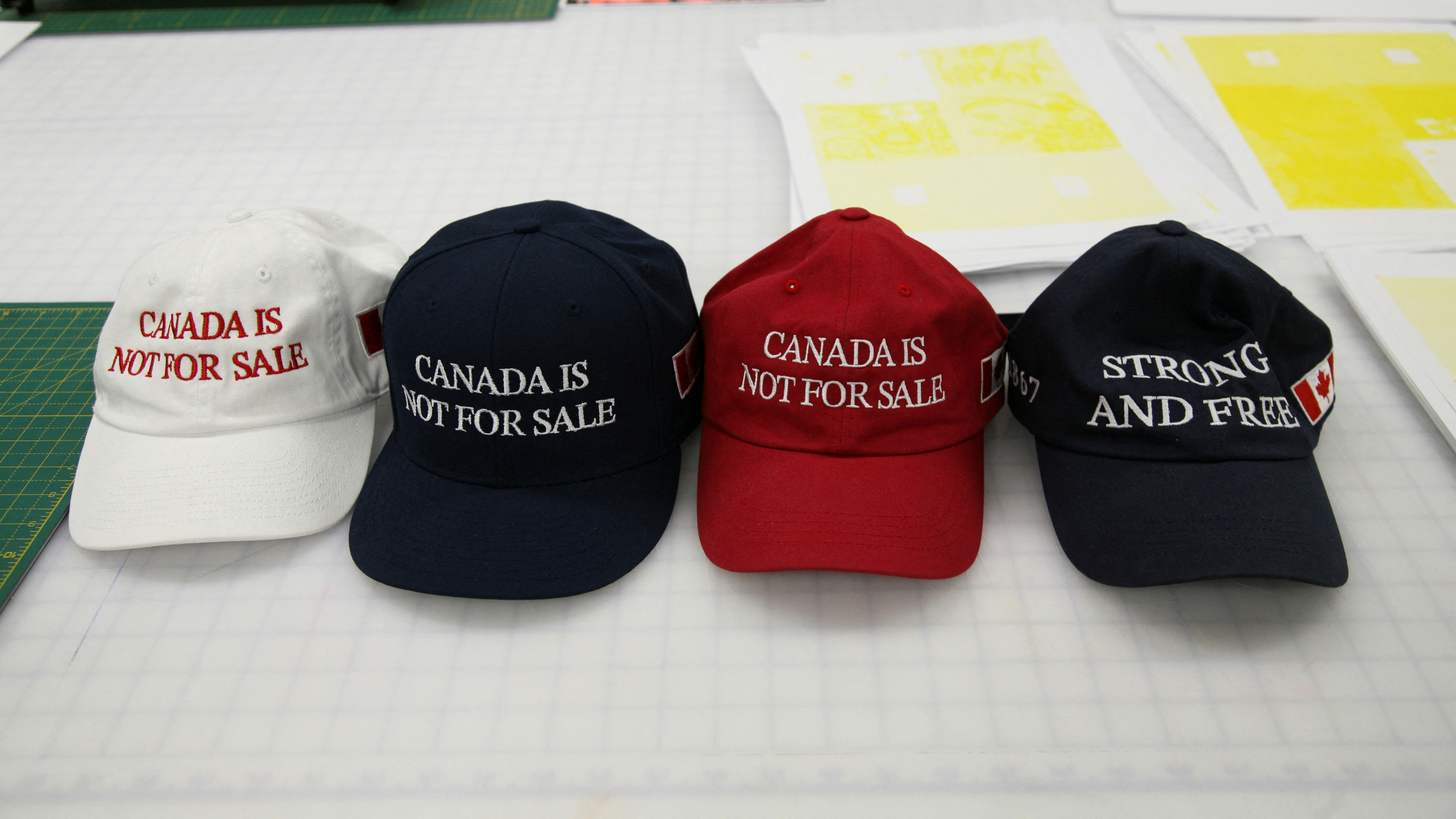 "Canada is not for sale" hats created by Jackpine are displayed at Ontario College of Art & Design University