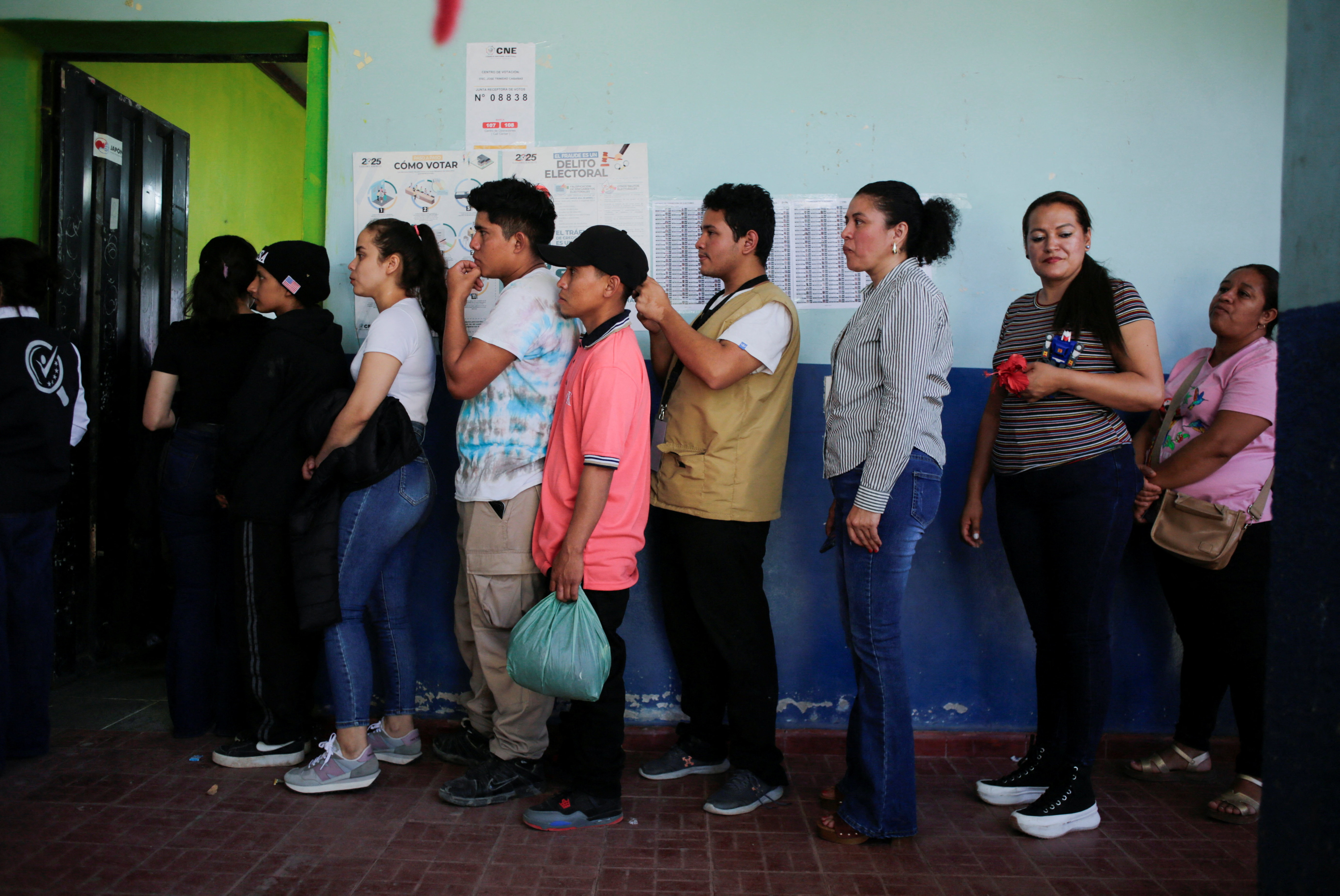 Residents head to vote in a rural town a week after election day, in San Antonio de Flores