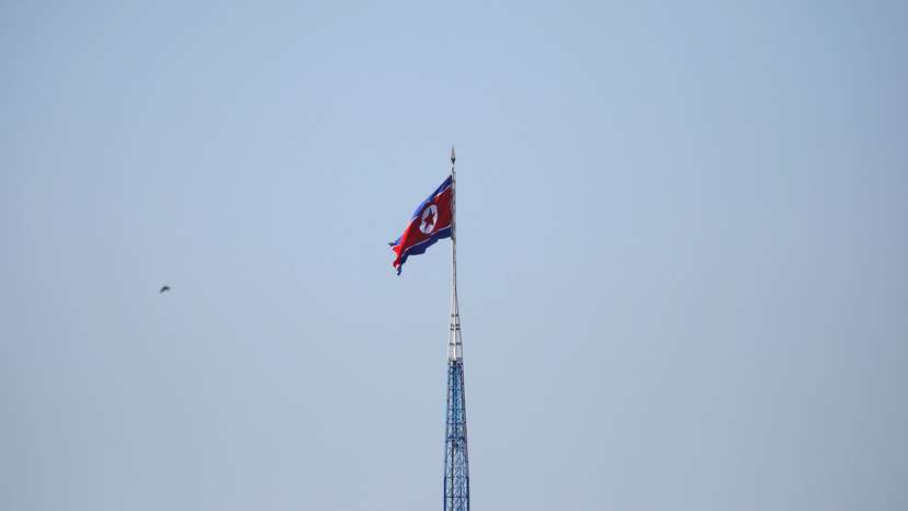 A North Korean flag flutters on top of a tower at the propaganda village of Gijungdong in North Korea, in this picture taken near the truce village of Panmunjom