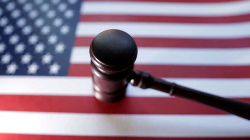 FILE PHOTO: Illustration shows U.S. flag and Judge gavel