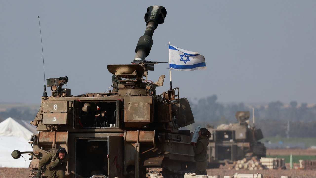 An Israeli artillery unit operates near the border with Gaza, amid the ongoing conflict between Israel and Palestinian Islamist group Hamas, as seen from southern Israel