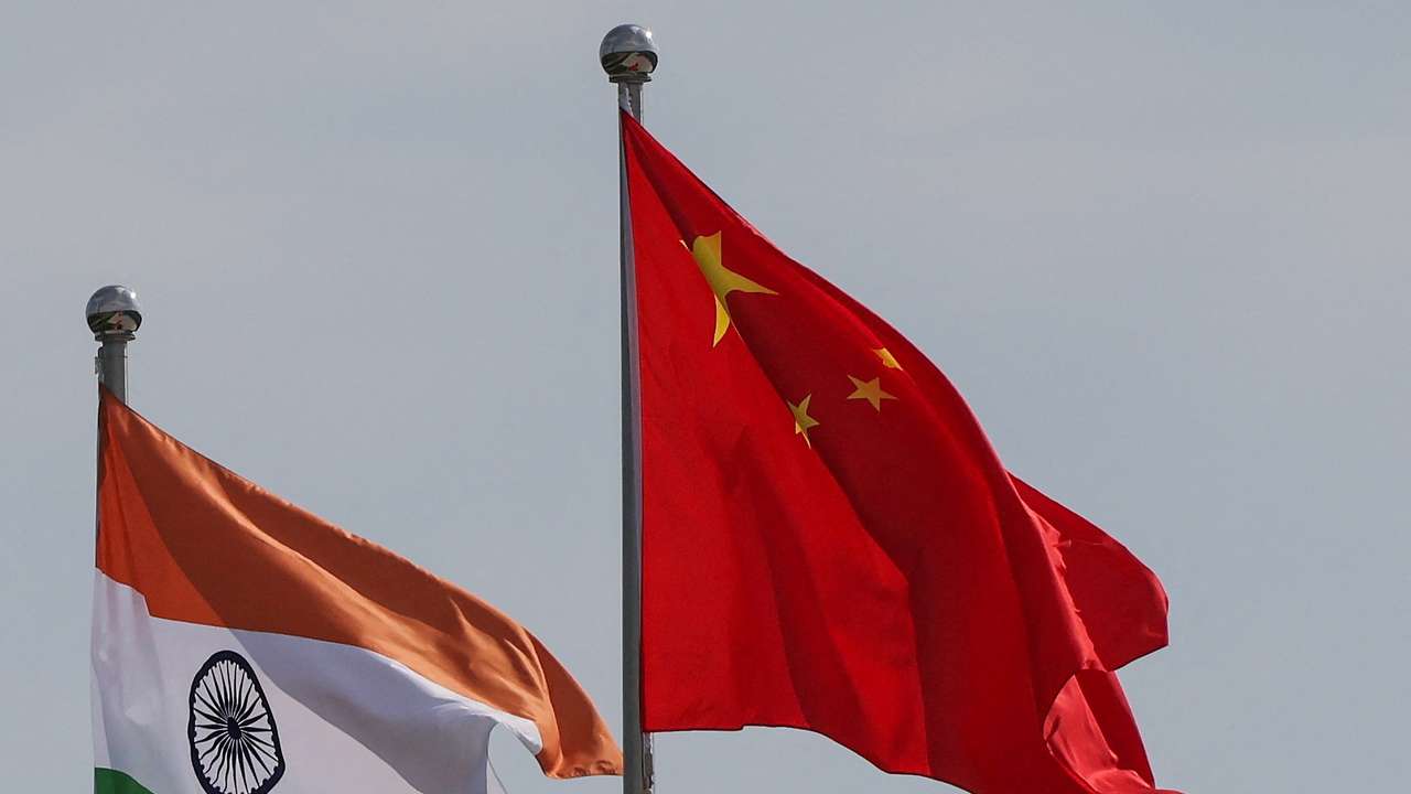 National flags of China and India fly next to the Meijiang Convention and Exhibition Center, a venue for 2025 Shanghai Cooperation Organisation (SCO) summit in Tianjin