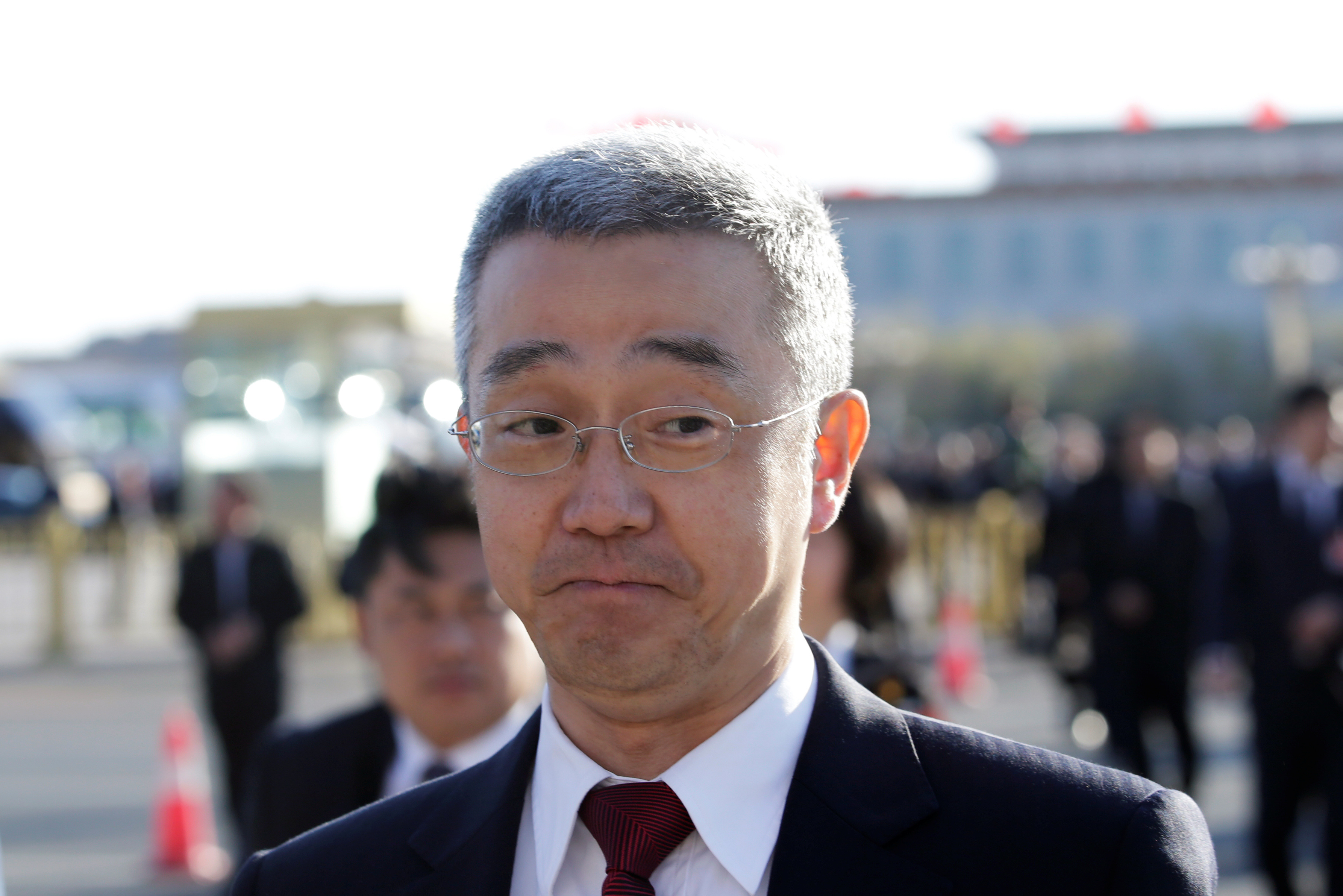 Hu Haifeng arrives for the closing session of the National People's Congress (NPC) at the Great Hall of the People in Beijing