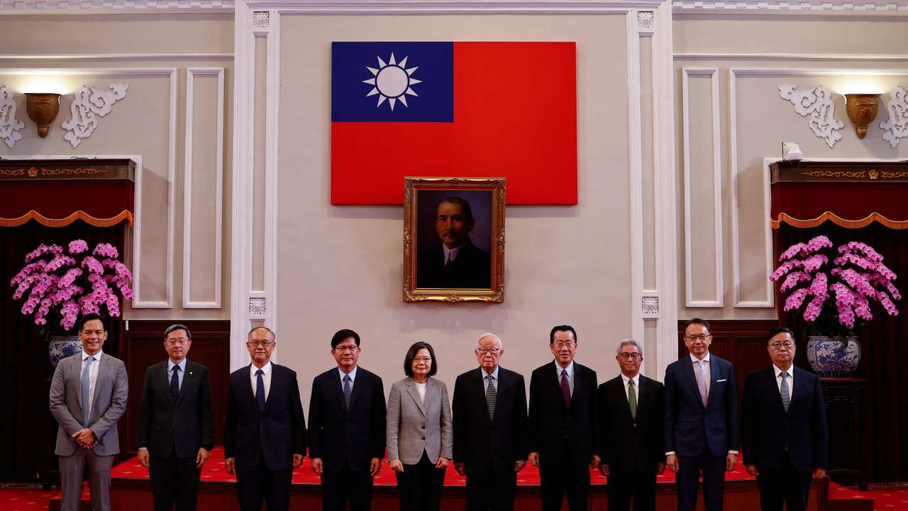 Taiwan's President Tsai Ing-wen poses for a photo with Taiwan's APEC representative and TSMC founder Morris Chang at a press conference in Taipei,