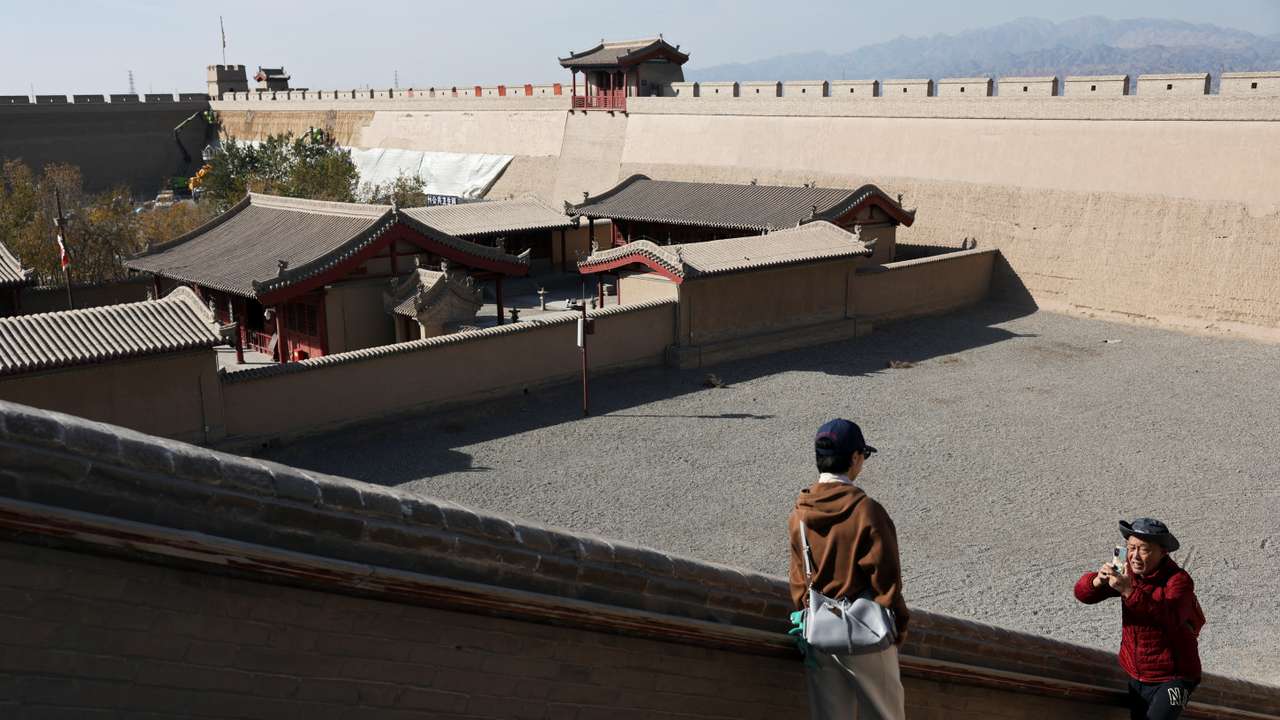 Tourists visit Jiayu Pass in Jiayuguan