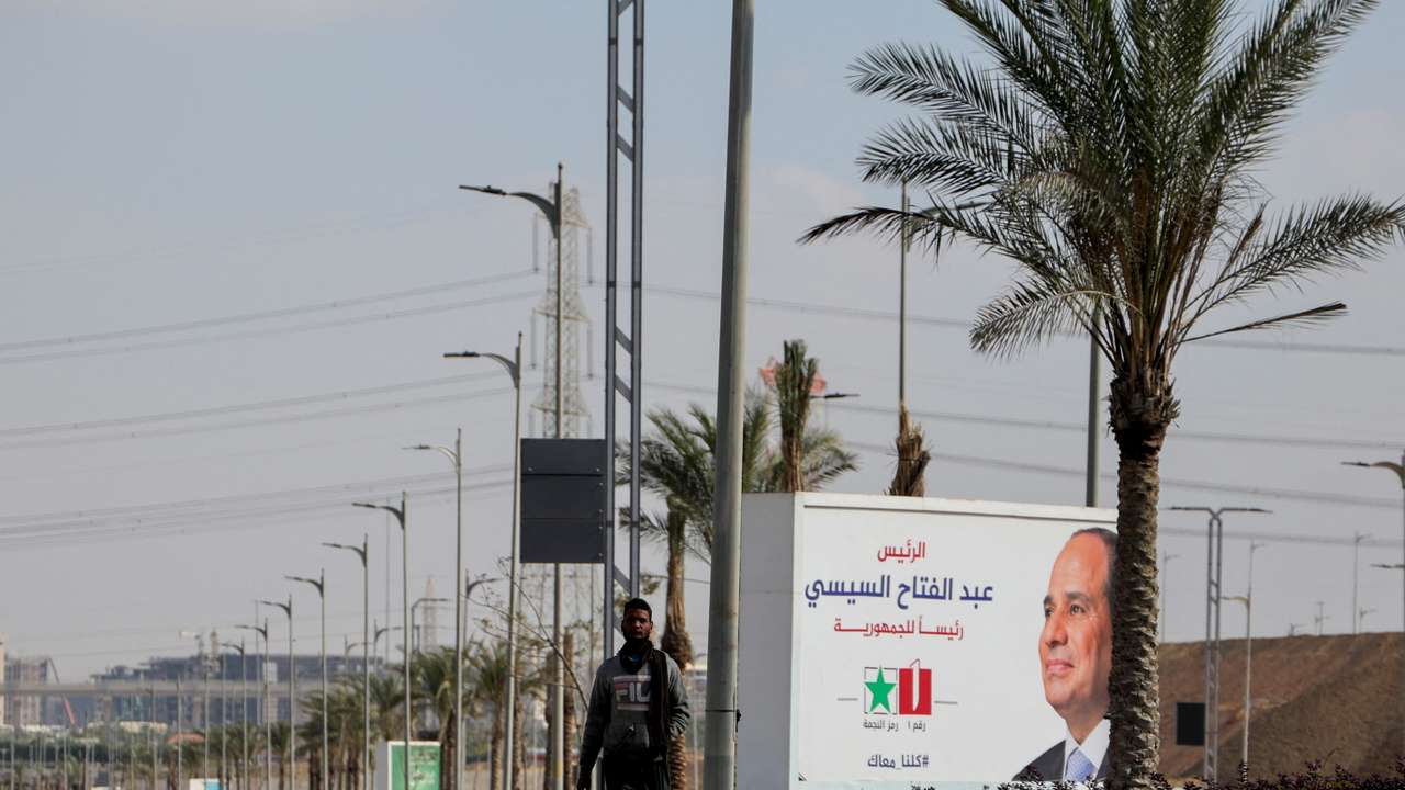 Banners supporting presidential candidate and current Egyptian President Abdel Fattah al-Sisi stand at the New Administrative Capital in the desert east of Cairo