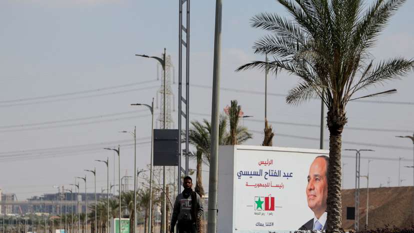 Banners supporting presidential candidate and current Egyptian President Abdel Fattah al-Sisi stand at the New Administrative Capital in the desert east of Cairo