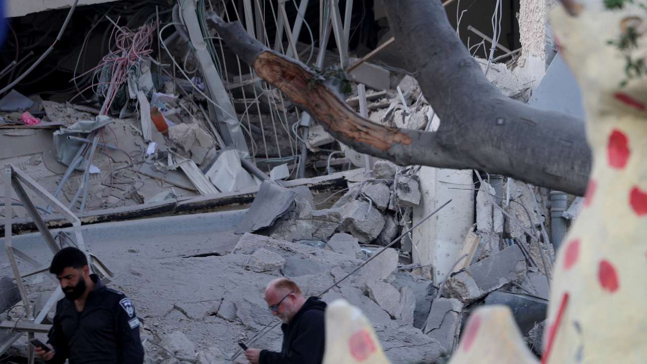 Scenes from a damaged site after a projectile fired from Yemen was intercepted, in Ramat Gan