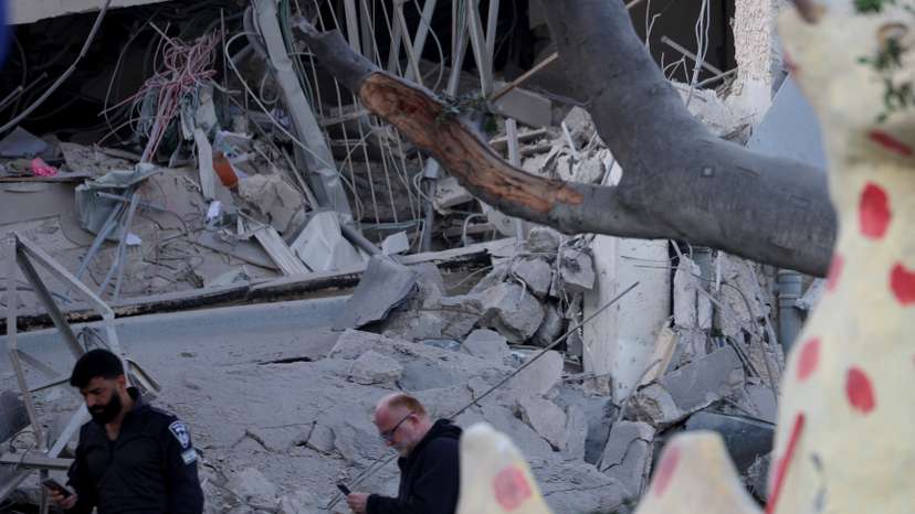 Scenes from a damaged site after a projectile fired from Yemen was intercepted, in Ramat Gan