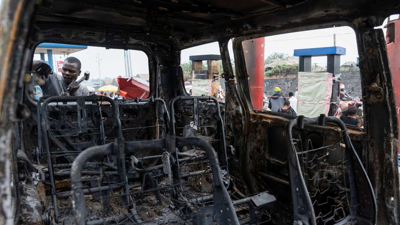 Residents survey damage from fighting between M23 rebels and Congolese forces in Goma