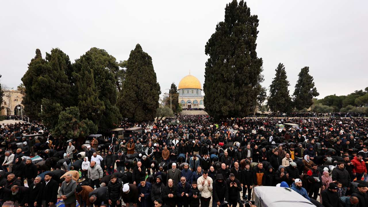Muslim worshippers attend the first Friday prayers of Ramadan in Al-Aqsa compound