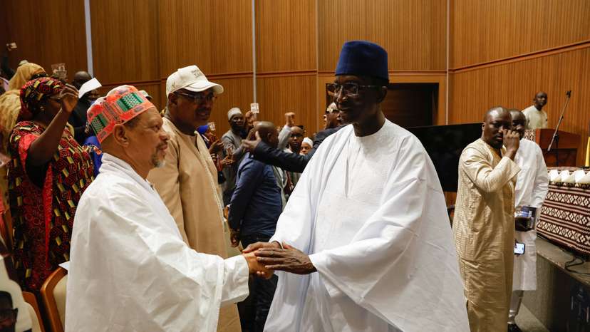 The Senegalese presidential candidate, Amadou Ba of Senegalese President Macky Sall's ruling coalition shakes hands with a supporter, in Dakar