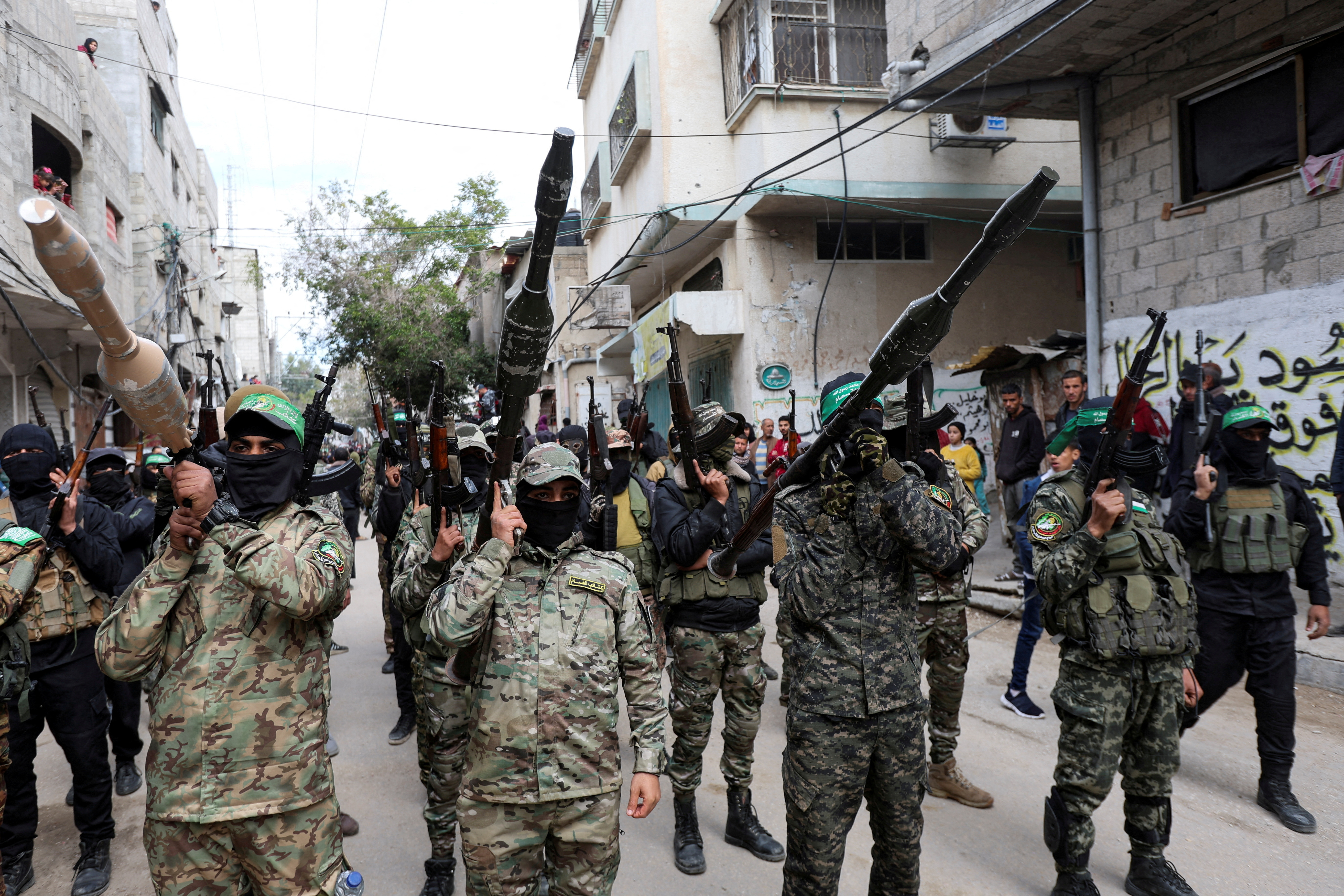 FILE PHOTO: Palestinians attend the funeral of senior Hamas deputy military commander Marwan Issa