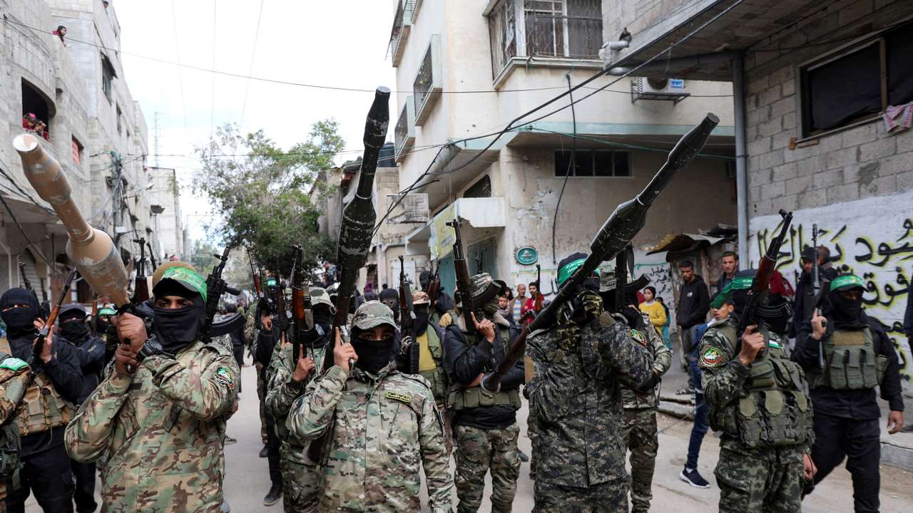 FILE PHOTO: Palestinians attend the funeral of senior Hamas deputy military commander Marwan Issa