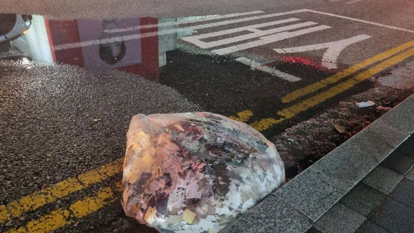 A plastic bag carrying various objects including what appeared to be trash that crossed inter-Korean border with a balloon believed to have been sent by North Korea, is pictured in Seoul