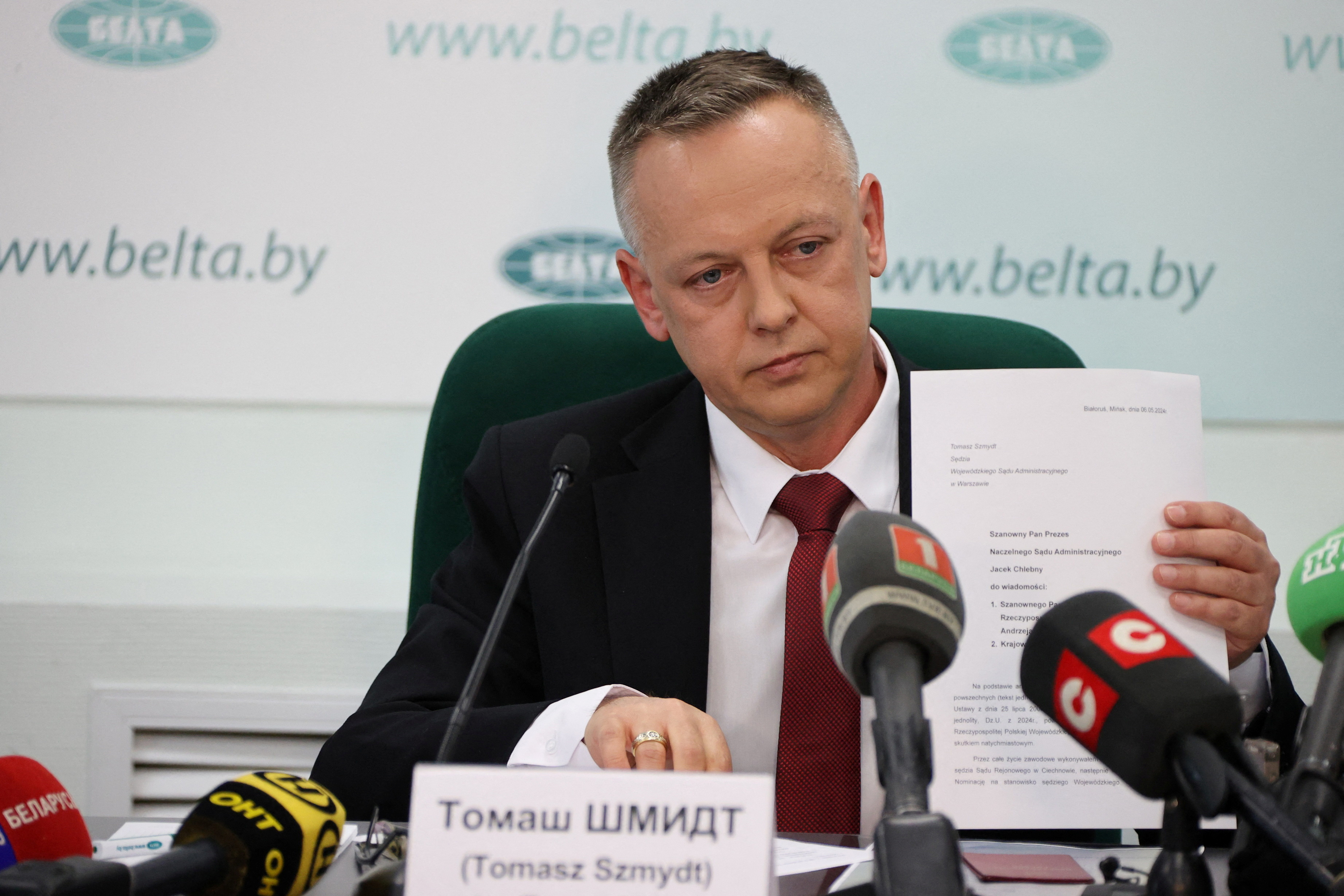 FILE PHOTO: Tomasz Szmydt, a Polish judge who requested political asylum in Belarus, attends a press conference in Minsk