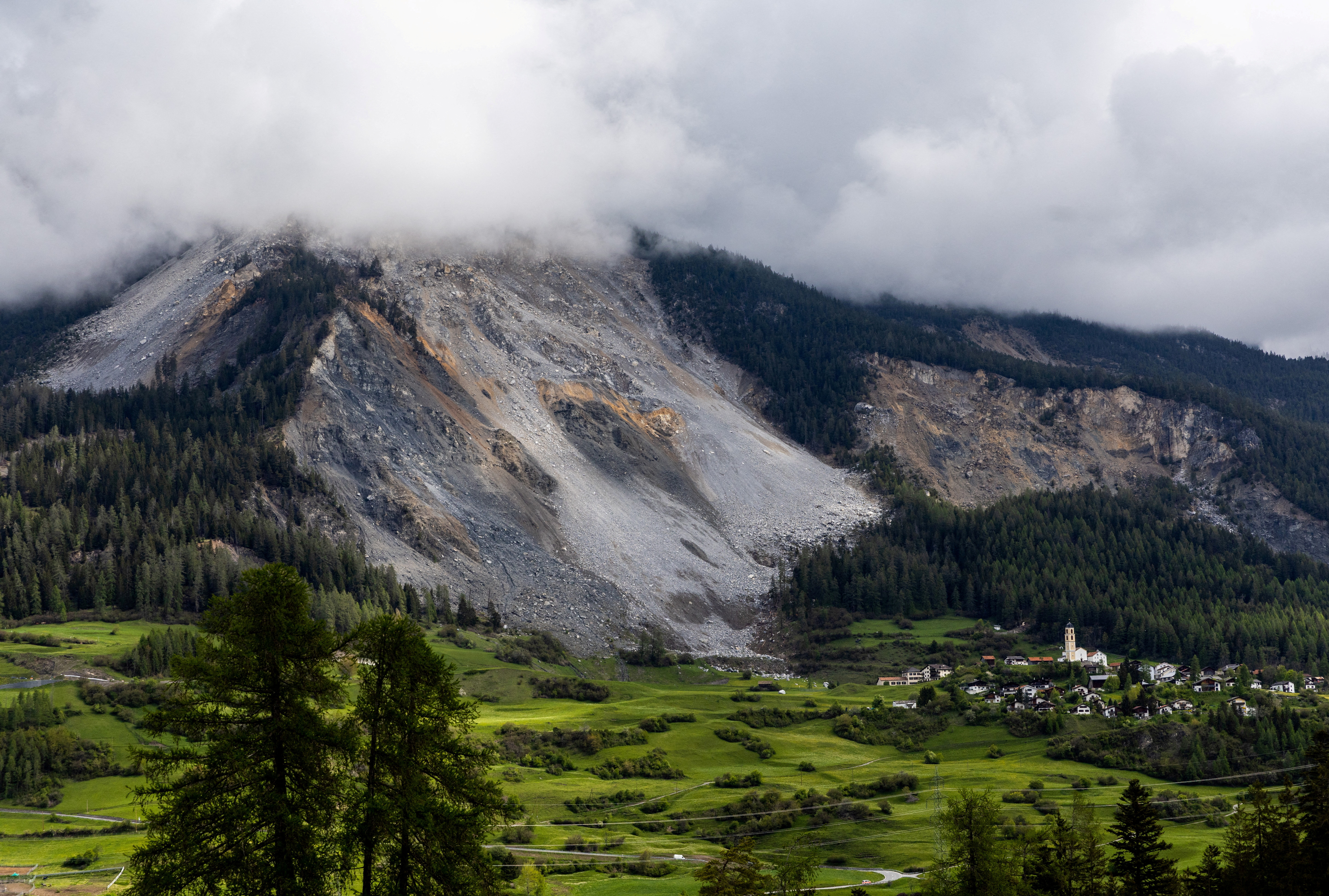 FILE PHOTO: Residents of a Swiss village Brienz evacuate due to risks of more rockslides