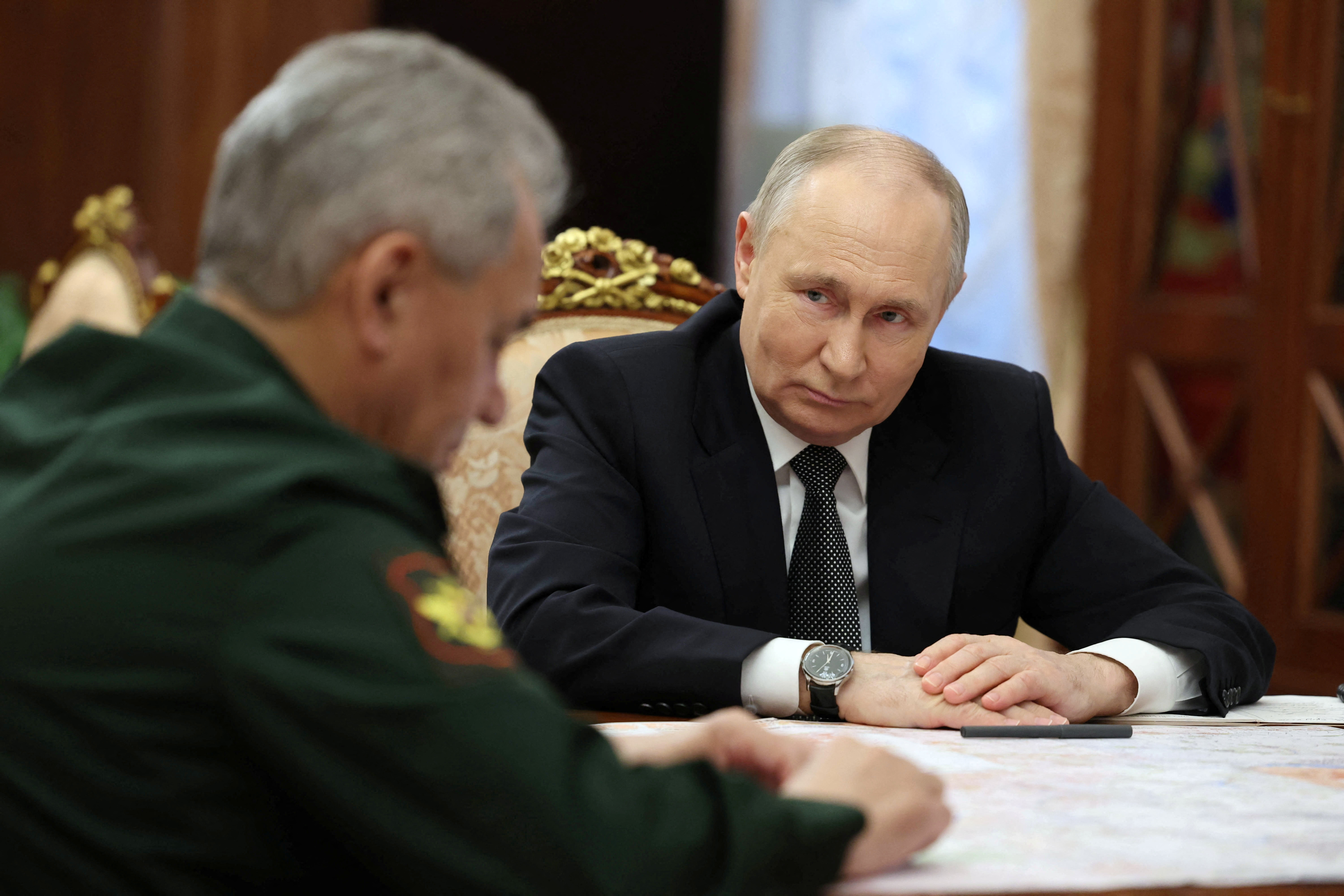 Russia's President Putin and Defence Minister Shoigu meet in Moscow