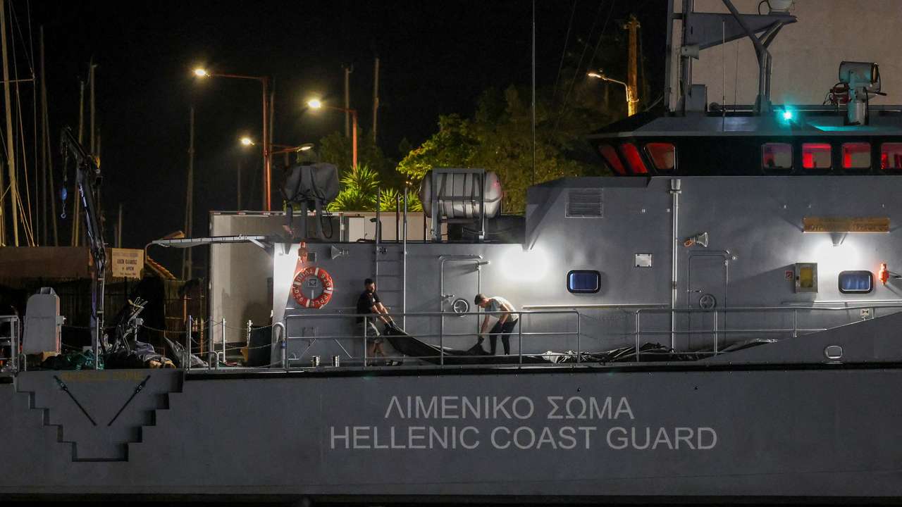 Body bags carrying migrants retrieved from sea arrive in Kalamata