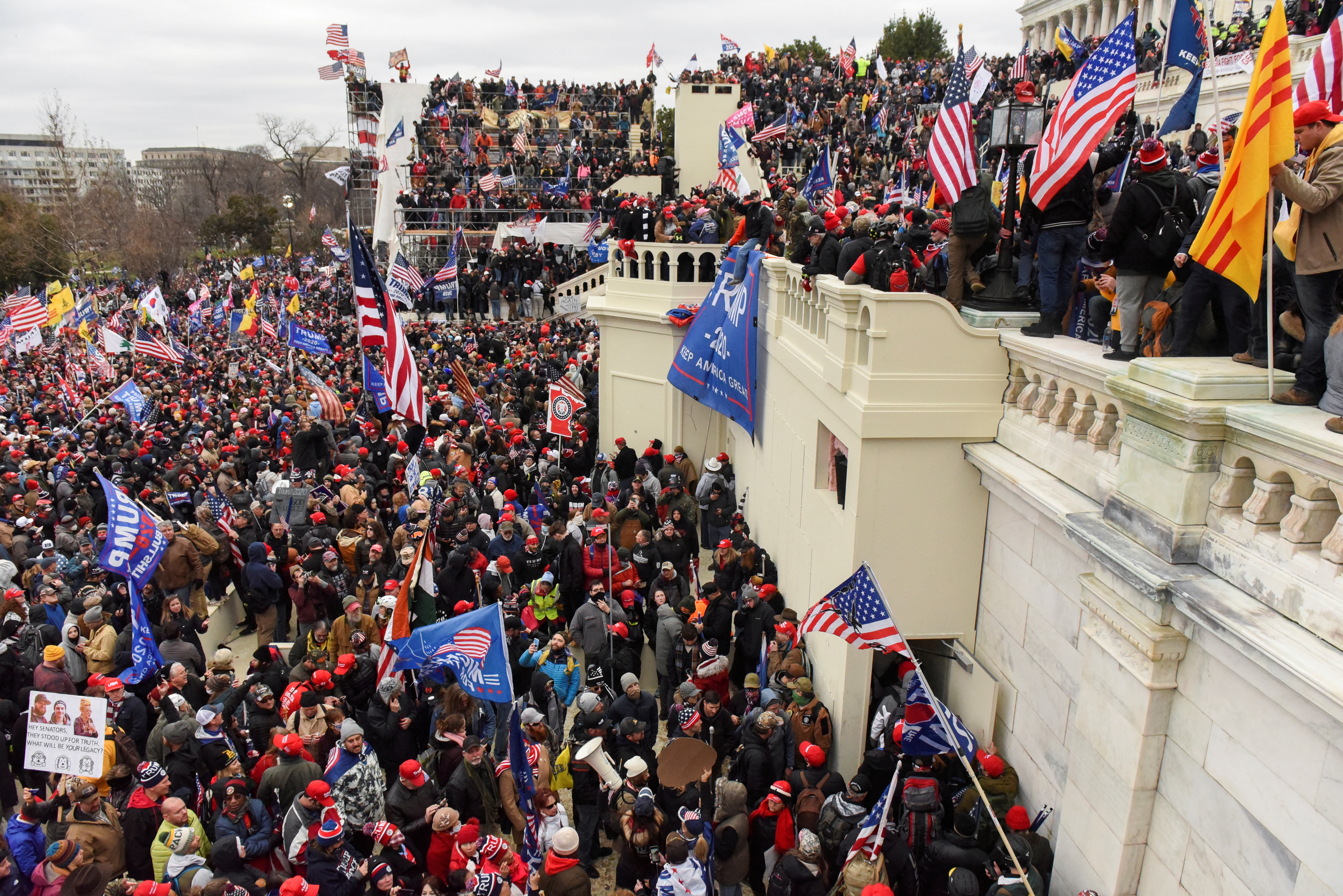 FILE PHOTO: Supporters of U.S. President Donald Trump gather in Washington