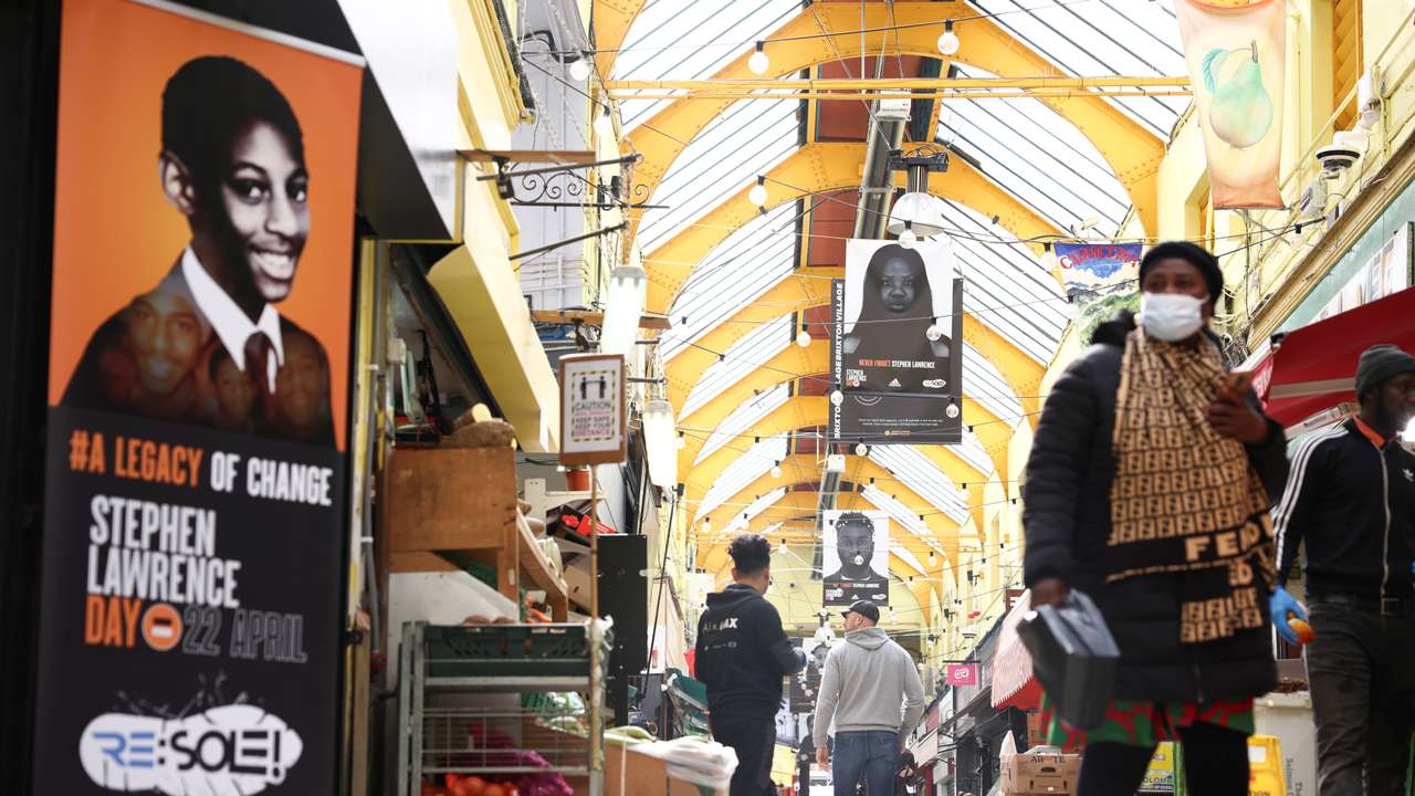 General view of the exhibition 'Never Forget Stephen Lawrence', comprised of 29 flags installed in Brixton Village ahead of National Stephen Lawrence Day